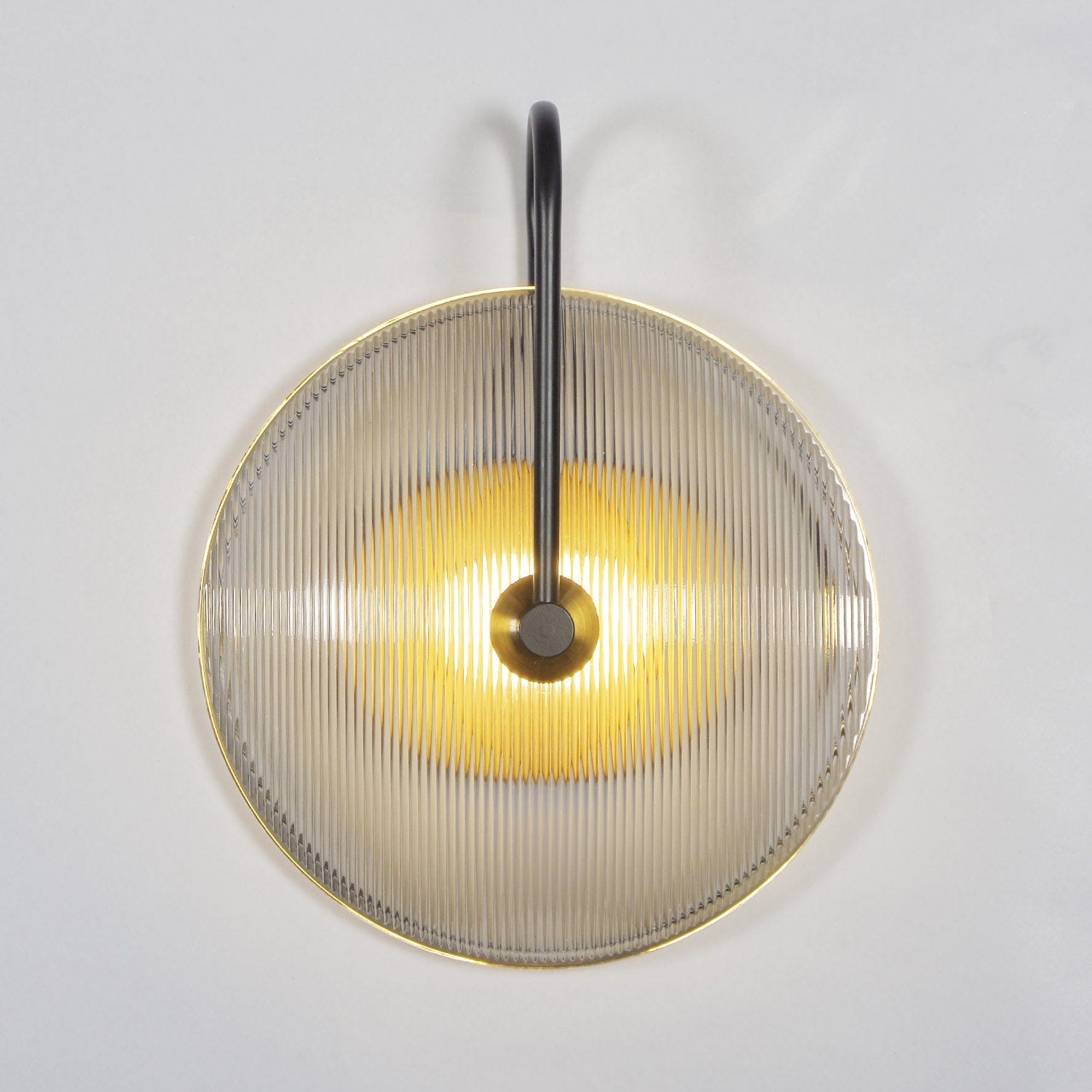 Light's Transformative Dance, Captured in Metal and Glass