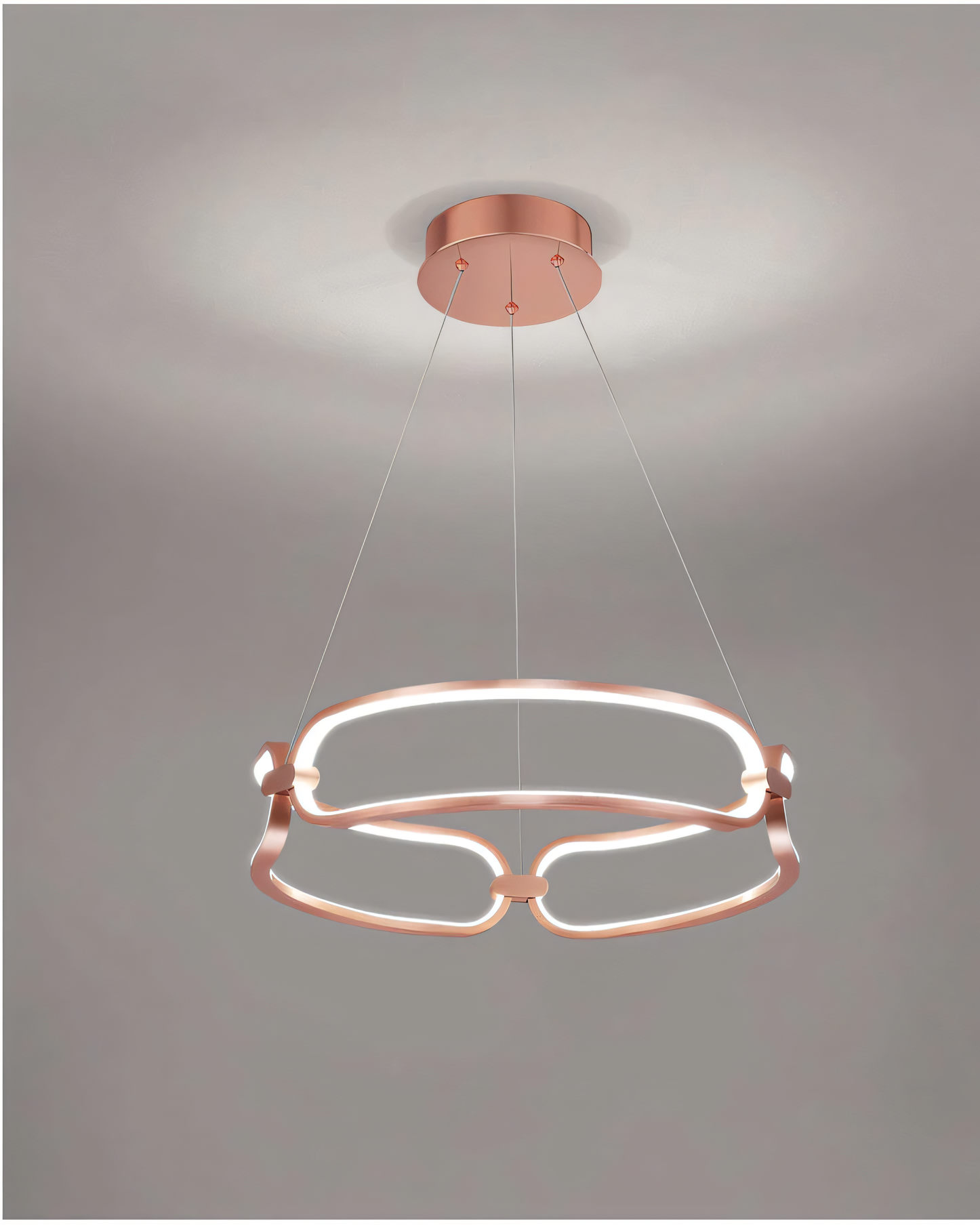 Elegant rose gold chandelier featuring a modern curved design and energy-efficient LED bulbs.