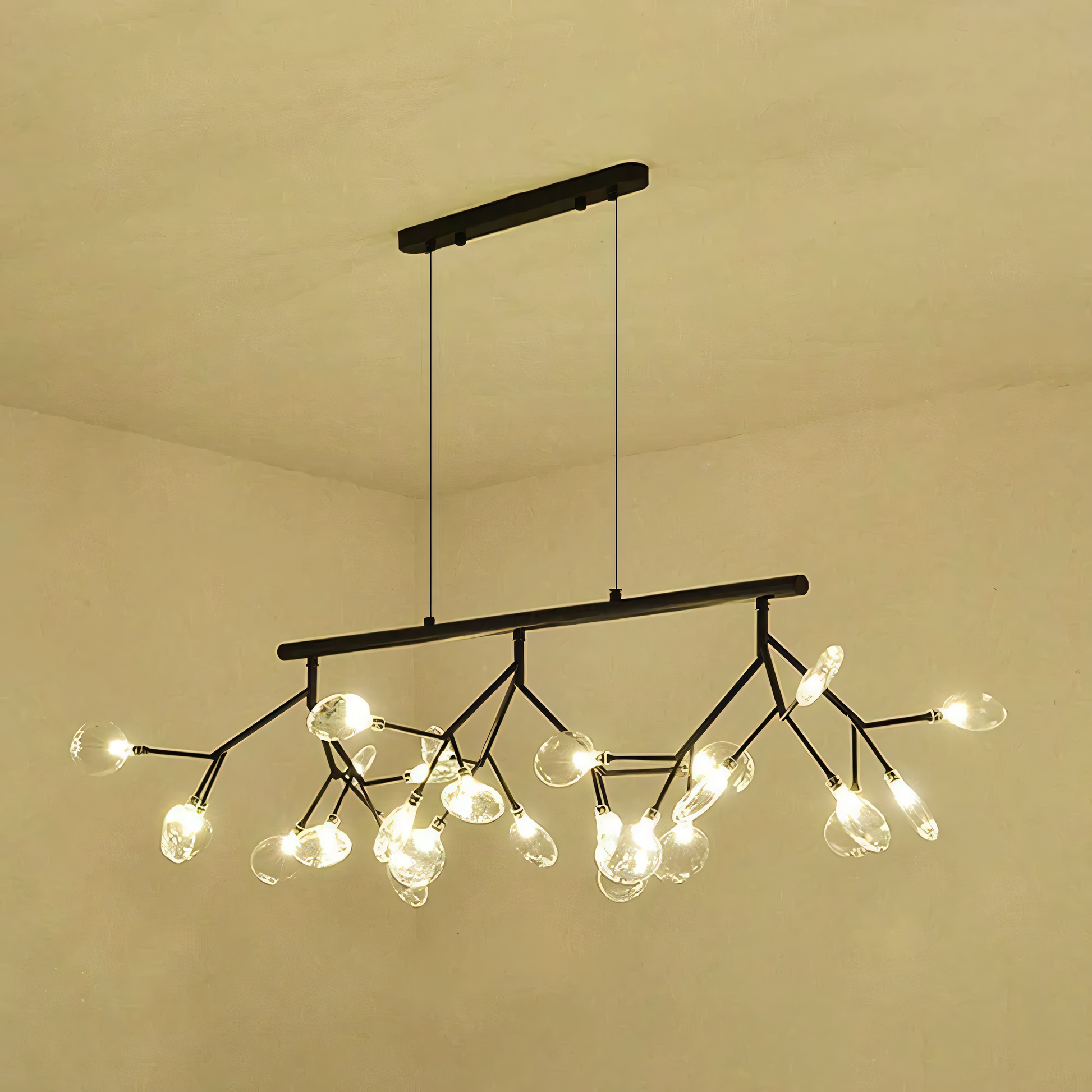 A close-up of the Blaze Modern Dining Chandelier reveals the intricate details of the black metal frame and the rods with LED tips.