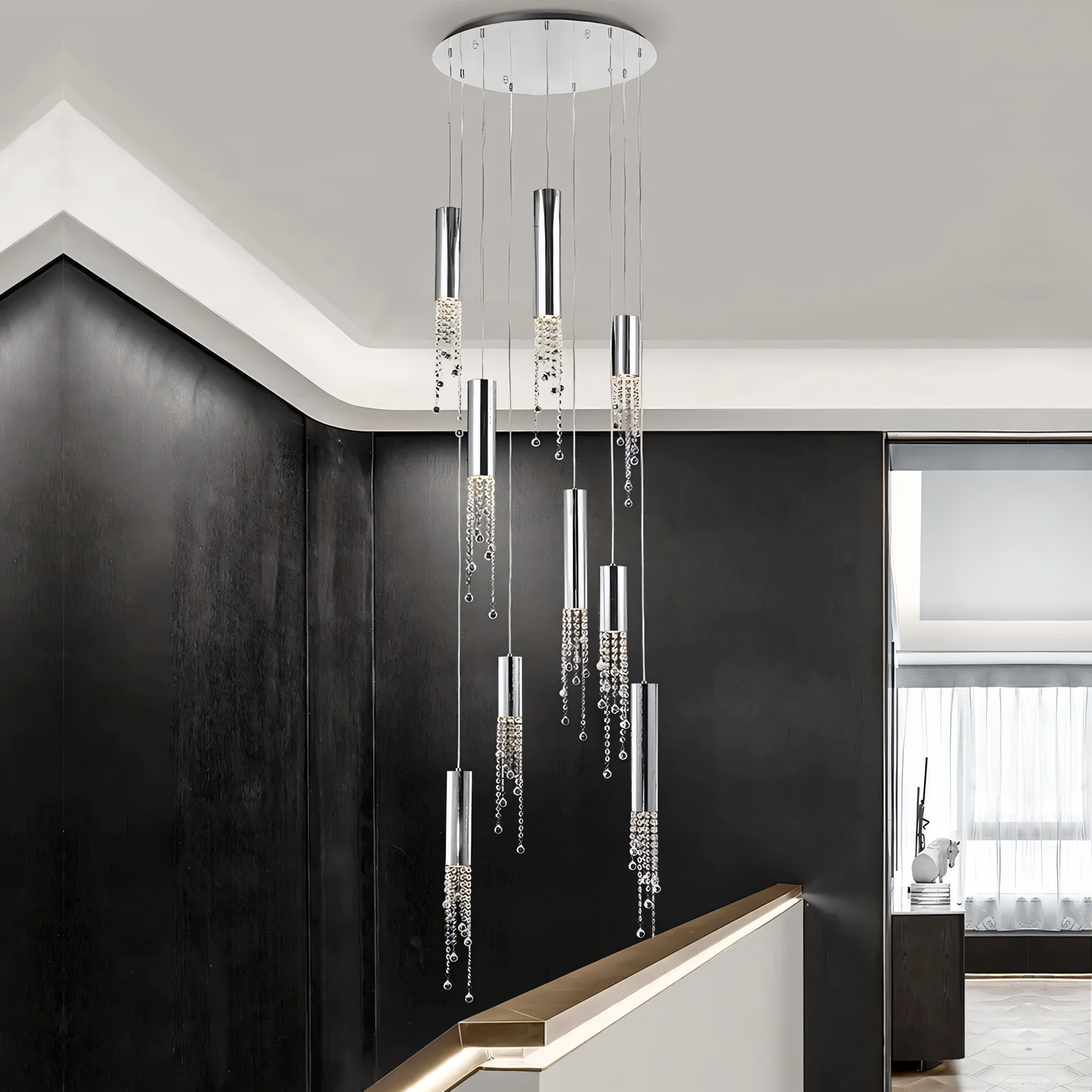 The Zooid Pendant Chandelier adds a touch of modern luxury to a minimalist living room.