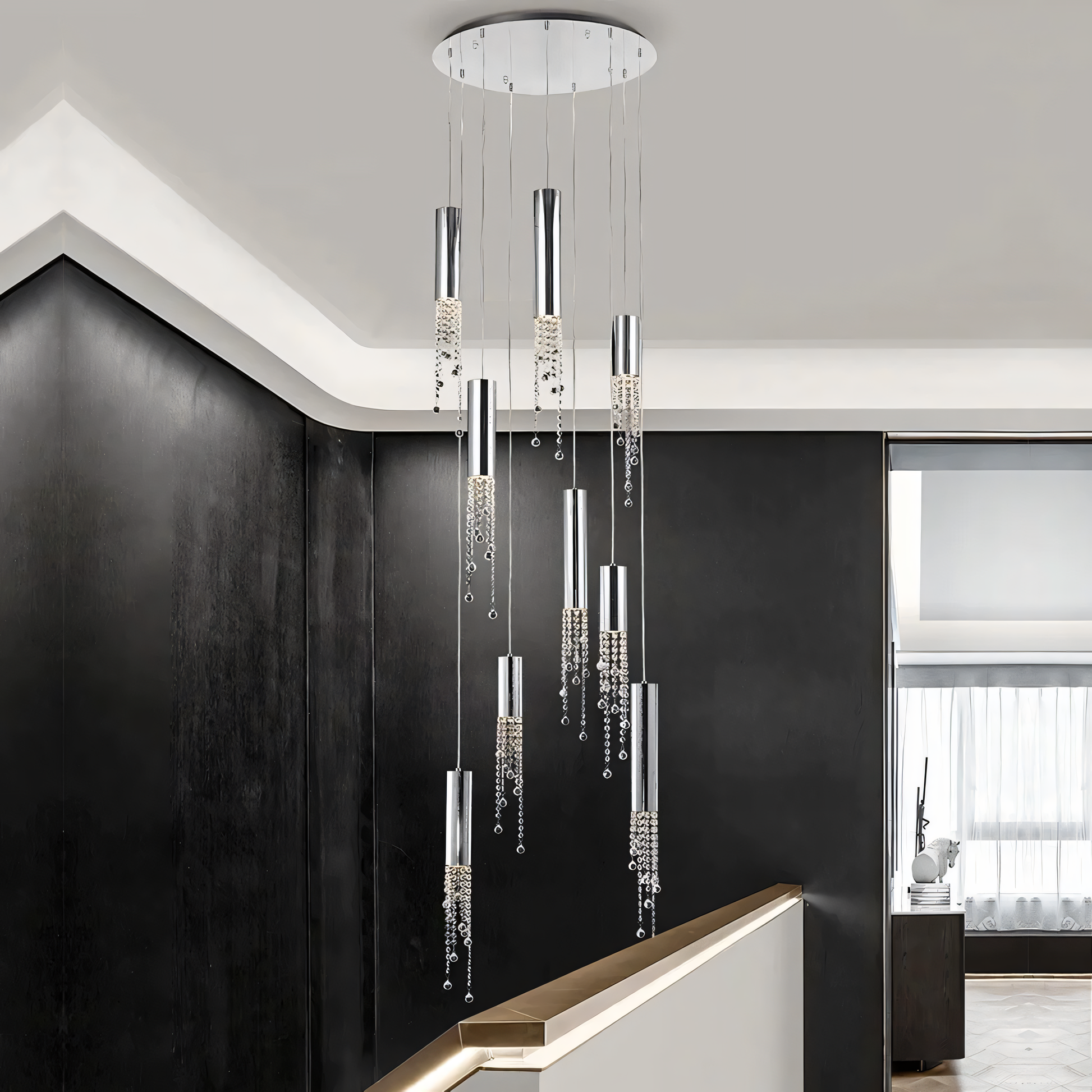 The Zooid Pendant Chandelier adds a touch of modern luxury to a minimalist living room.