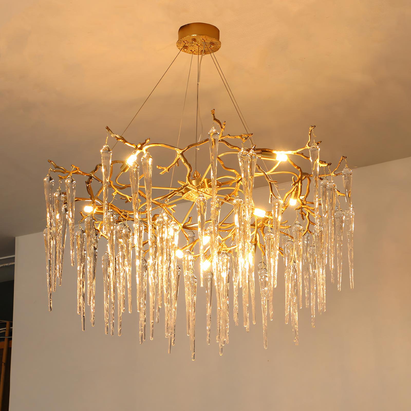Adjustable hanging chandelier with warm gold metal frame