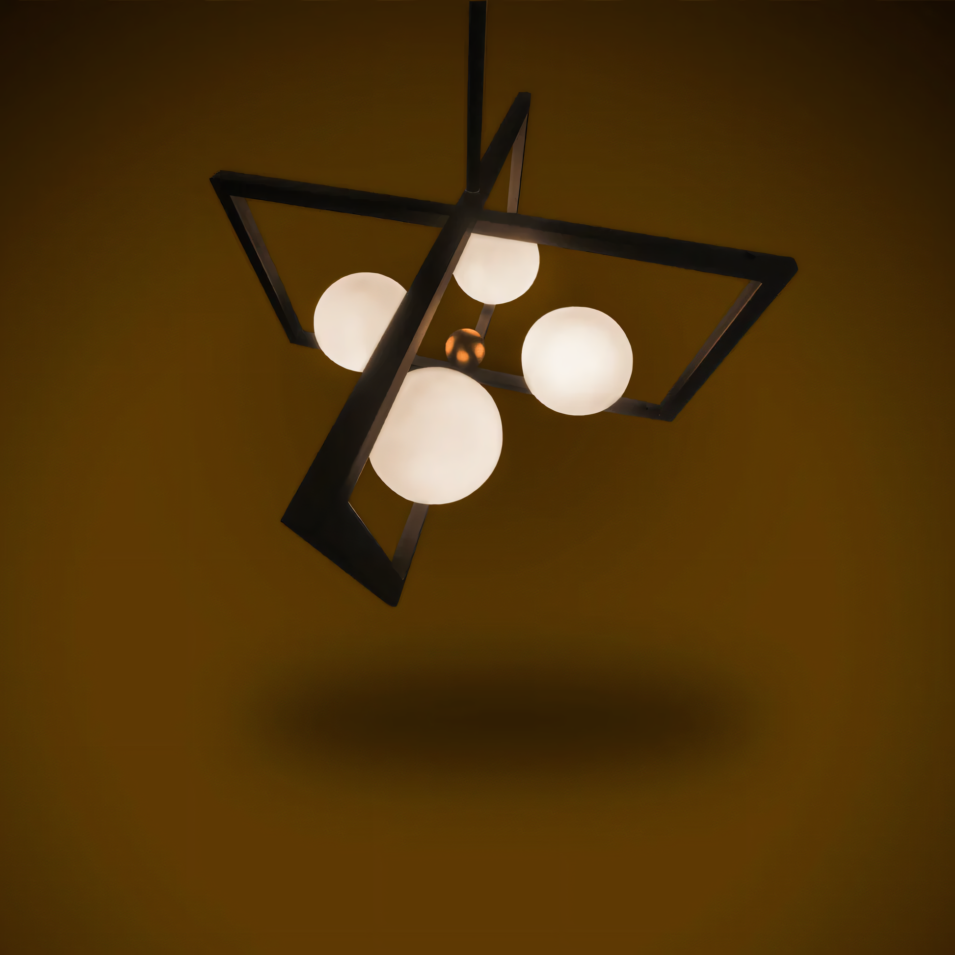 The Simmetria Hanging Light, a vintage-inspired centerpiece, hangs above a dining table in a modern home. The light's warm glow fills the room.