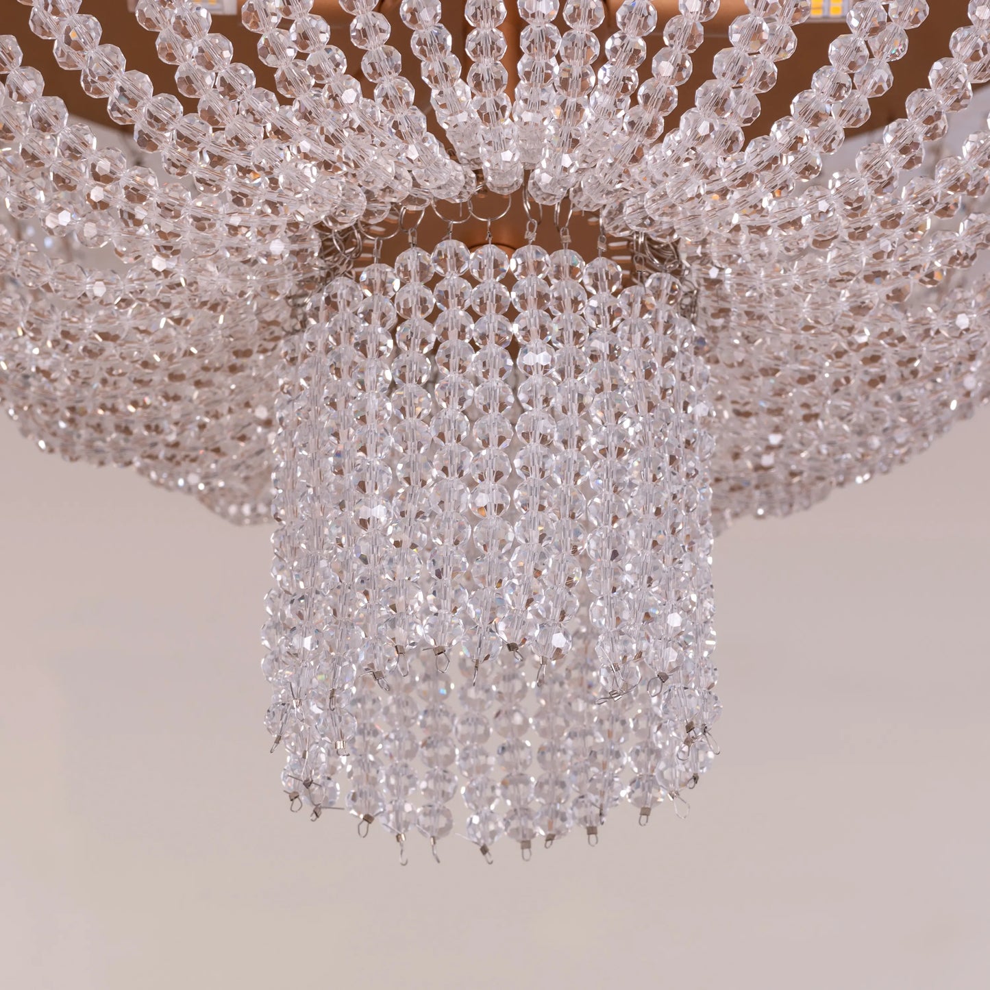 Warm Embrace Gold Crystal Ceiling Light featuring a golden framework adorned with multifaceted crystals, designed to create a luxurious and comforting warm glow in elegant spaces.