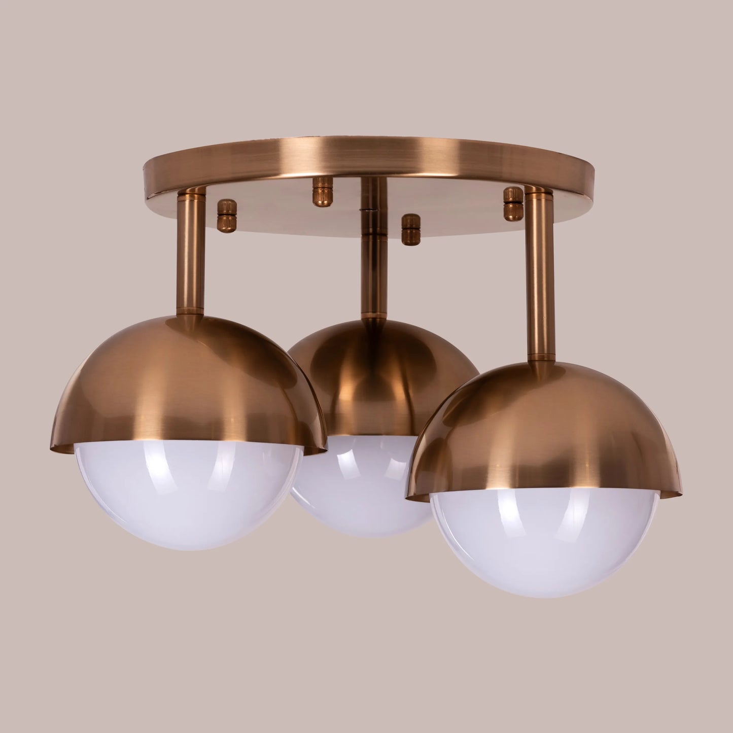 Stylish ceiling light with a rich gold finish.
