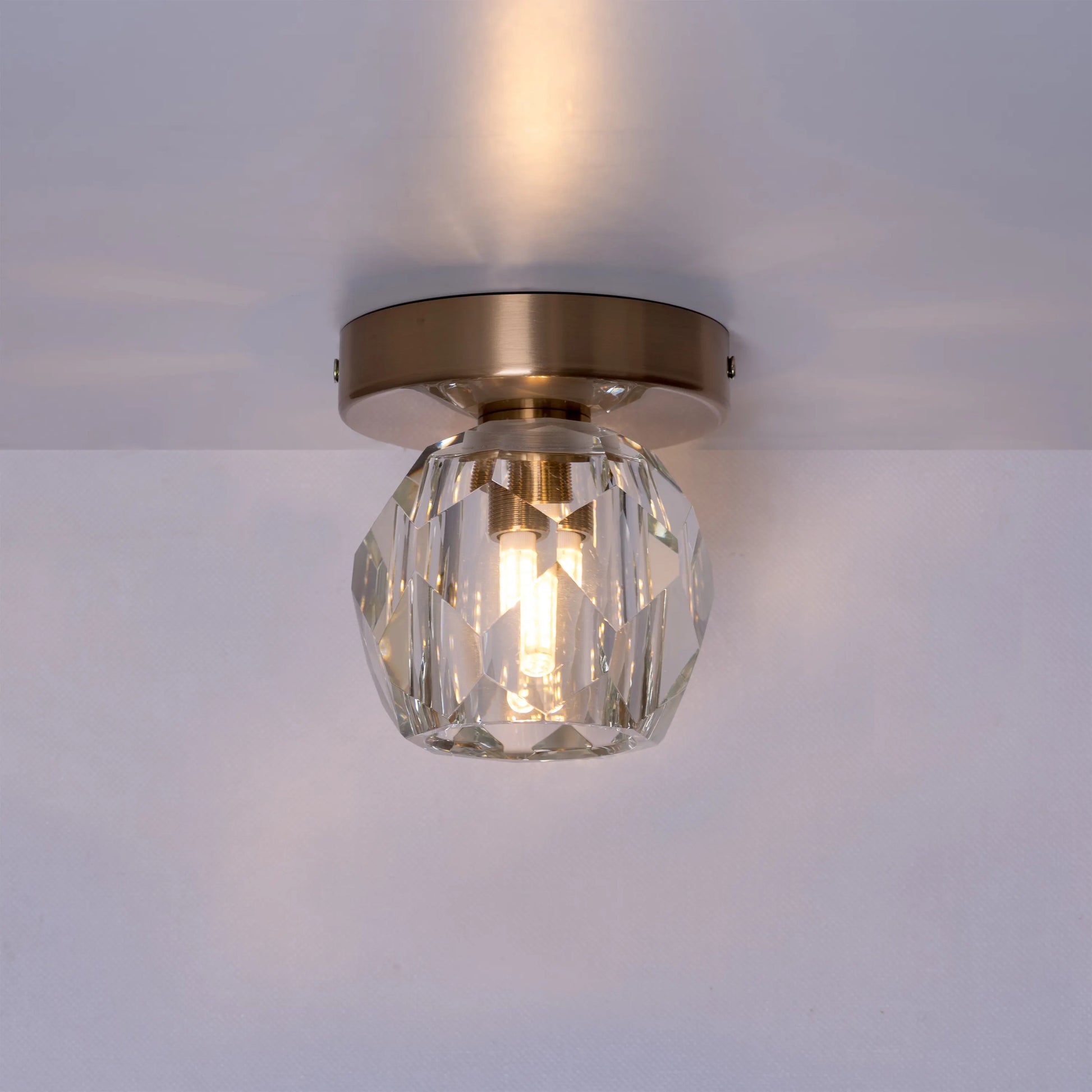 White Diamond Ceiling Light featuring a geometric, faceted design inspired by cut diamonds, with a pristine white finish that creates a luxurious and brilliantly reflective illumination for sophisticated spaces.