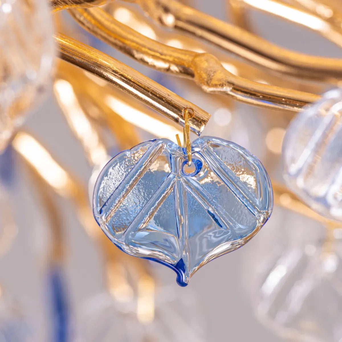 Yacht Life Gold Crystal Ceiling Light illuminating an elegant living room with a warm, luxurious glow
