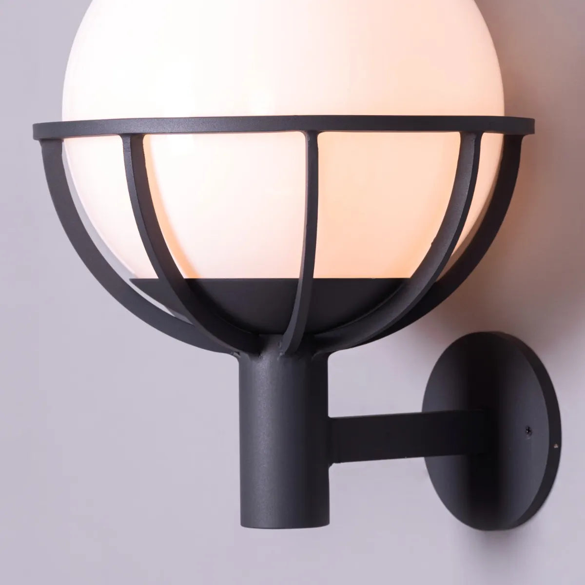 Full Moon Indoor/Outdoor Wall Light – a circular, moon-inspired wall light with energy-efficient LED illumination, perfect for both indoor and outdoor use.