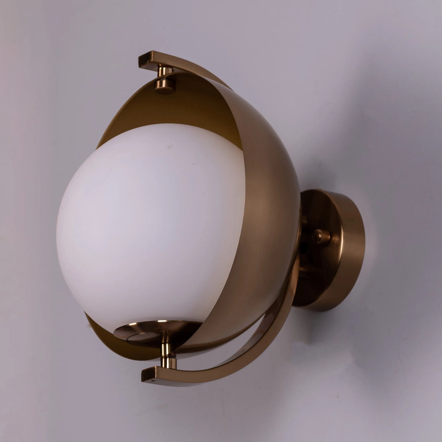 Spot On Wall Light – a minimalist, adjustable wall light providing focused illumination, ideal for modern interiors and functional spaces.