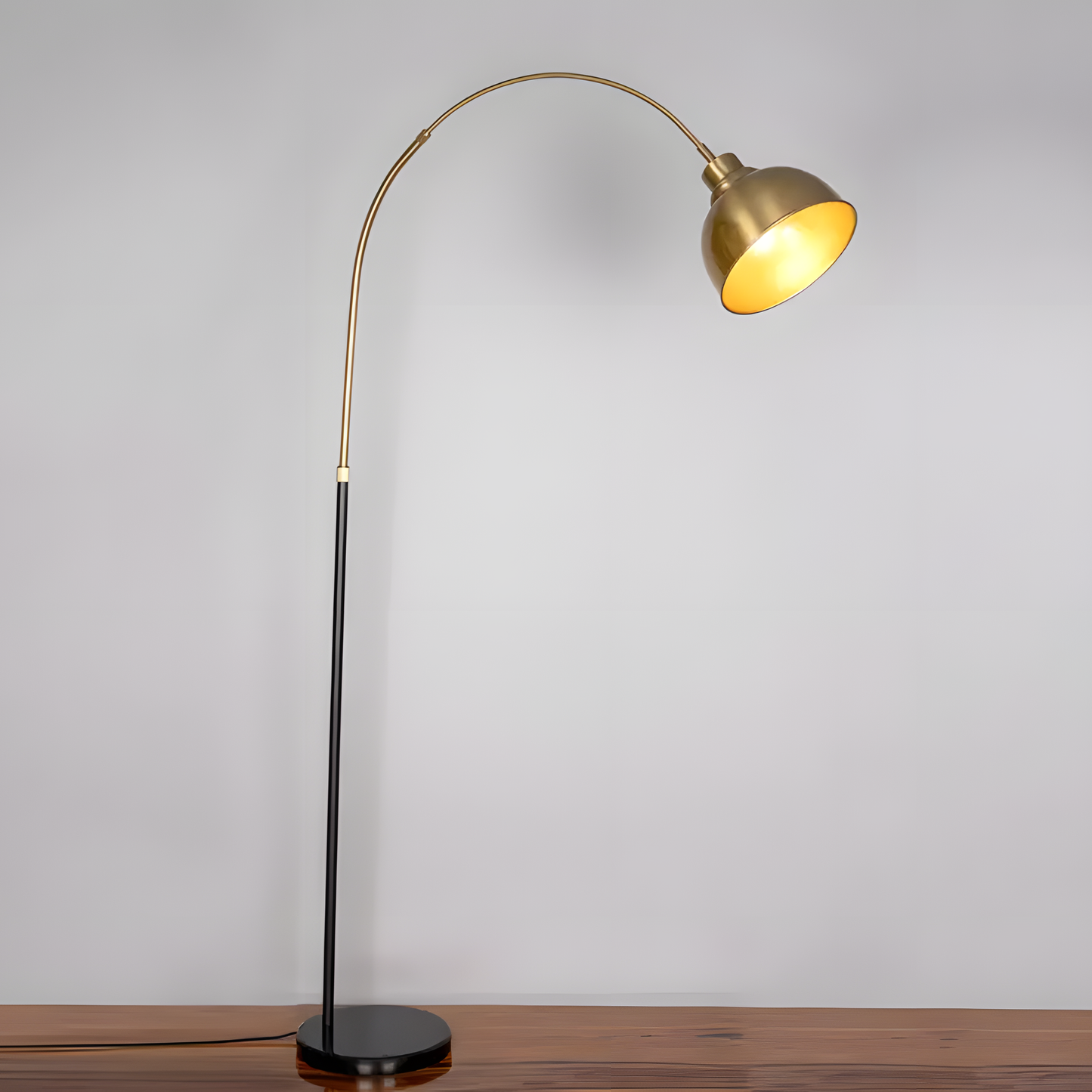 Detailed view of the Lovelorn (Gold) Marble Floor Lamp's matte gold finish and sleek base