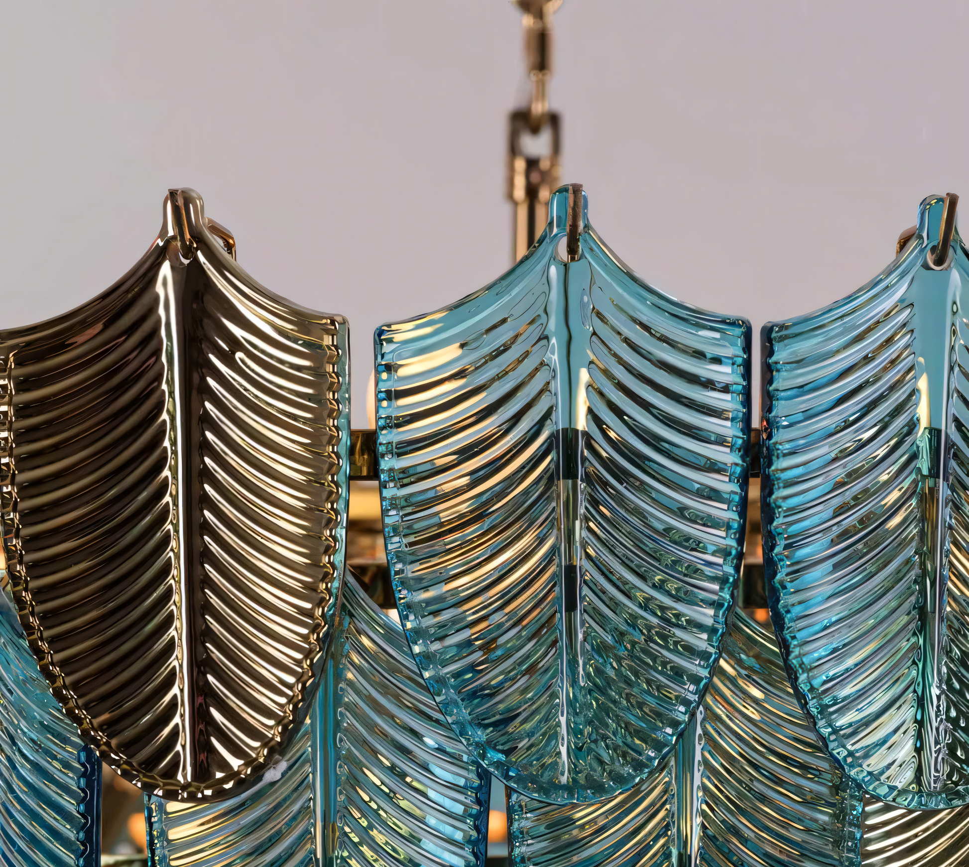 The Gratus Luxe Modern Glass Leaf Chandelier is an energy-efficient lighting solution that adds a touch of luxury to any space.
