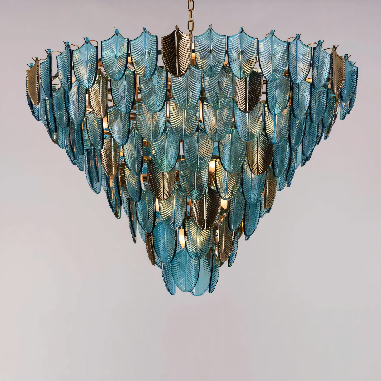 The Gratus Luxe Modern Glass Leaf Chandelier adds a touch of whimsy and sophistication to a beach villa dining room table setting.