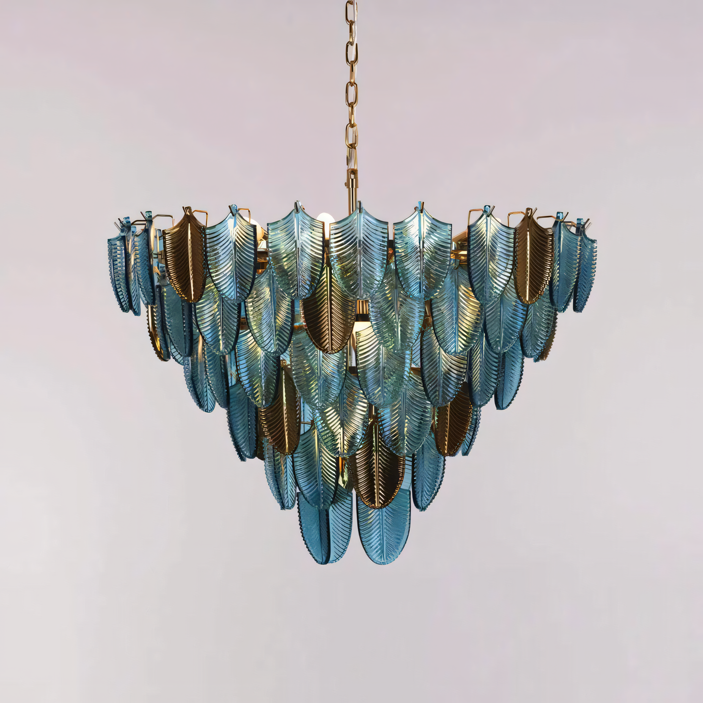 A close-up of the Gratus Luxe Modern Glass Leaf Chandelier reveals the intricate details of the chrome frame and the hand-blown glass leaves.