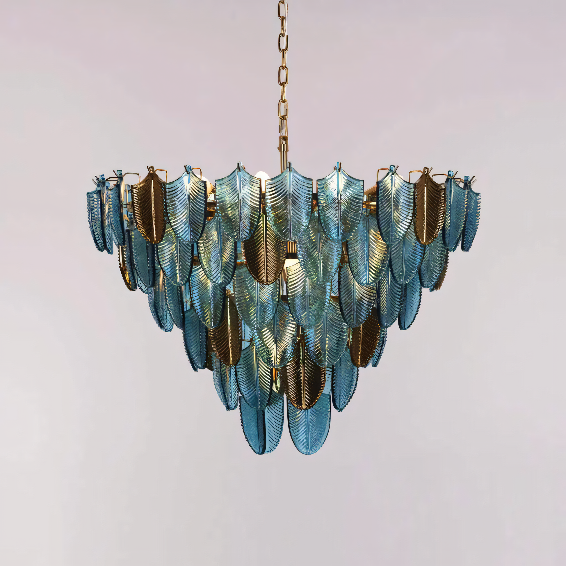 A close-up of the Gratus Luxe Modern Glass Leaf Chandelier reveals the intricate details of the chrome frame and the hand-blown glass leaves.