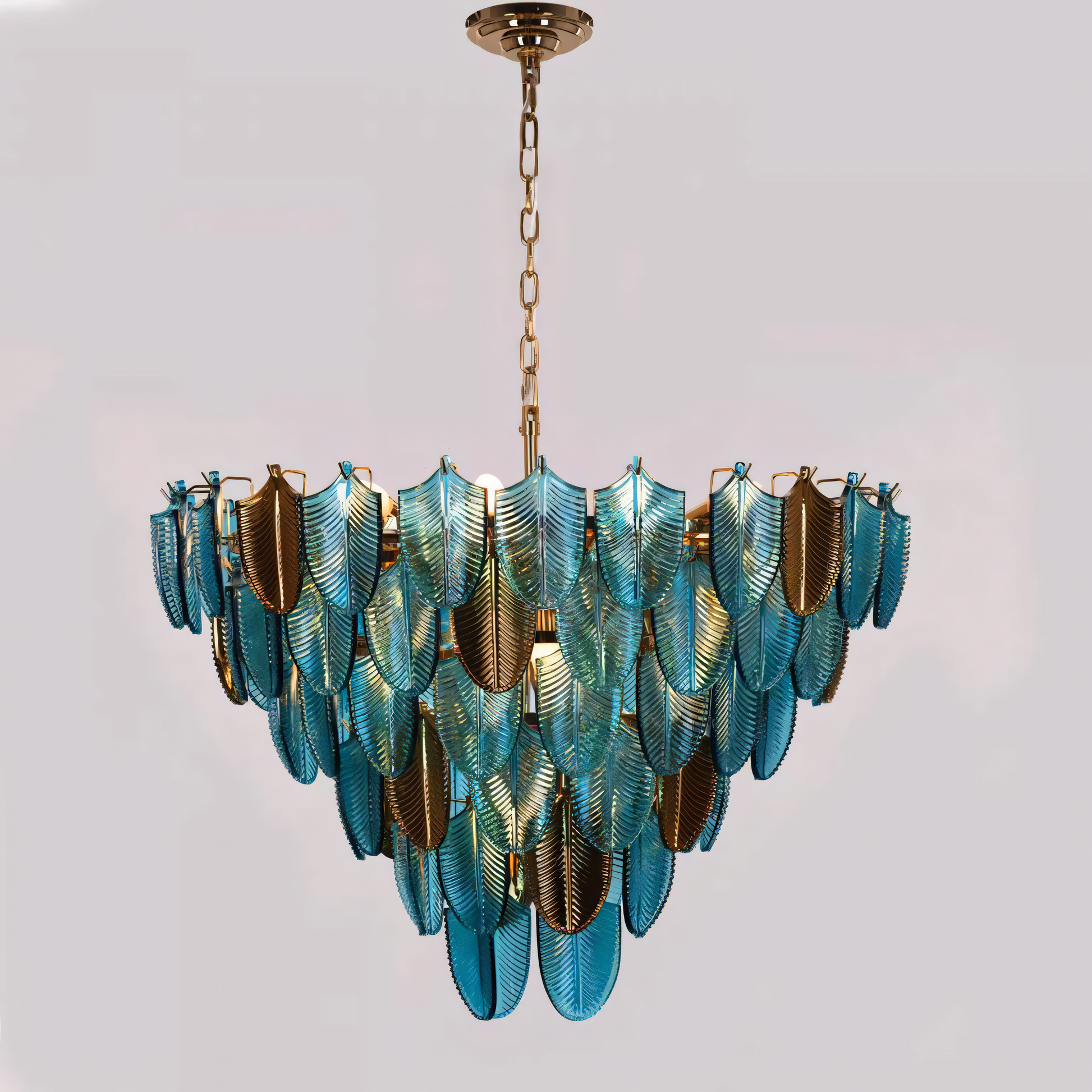 The Gratus Luxe Modern Glass Leaf Chandelier mimics the look of a porthole window, inviting you to gaze upon a captivating spectacle of light.
