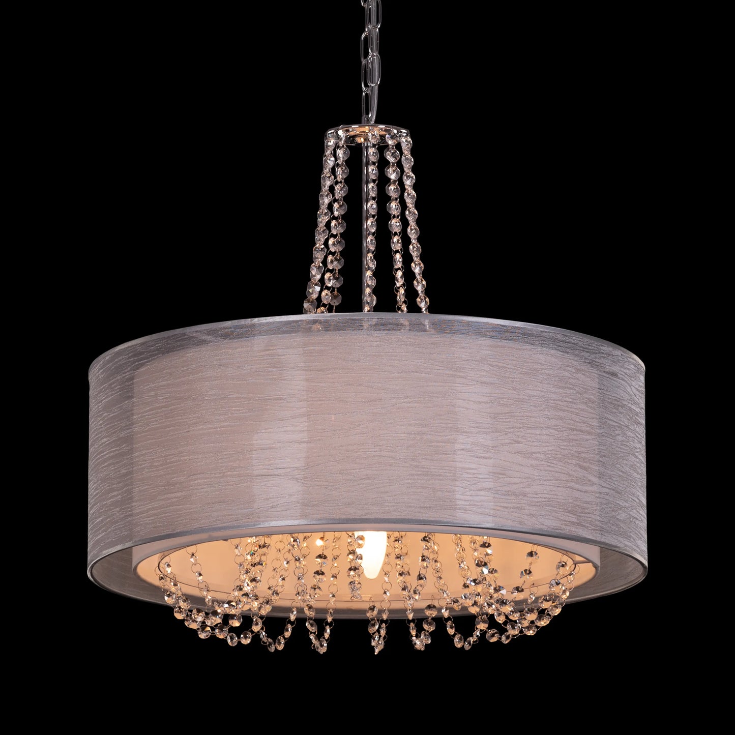 Gorgeous Girl crystal chandelier illuminating a lavish dining room.