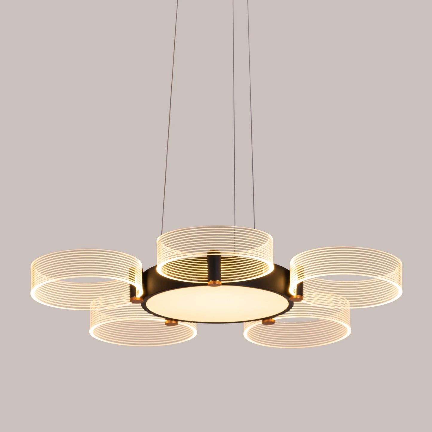 Stylish Meet And Greet Chandelier with five adjustable heads in a modern living room.