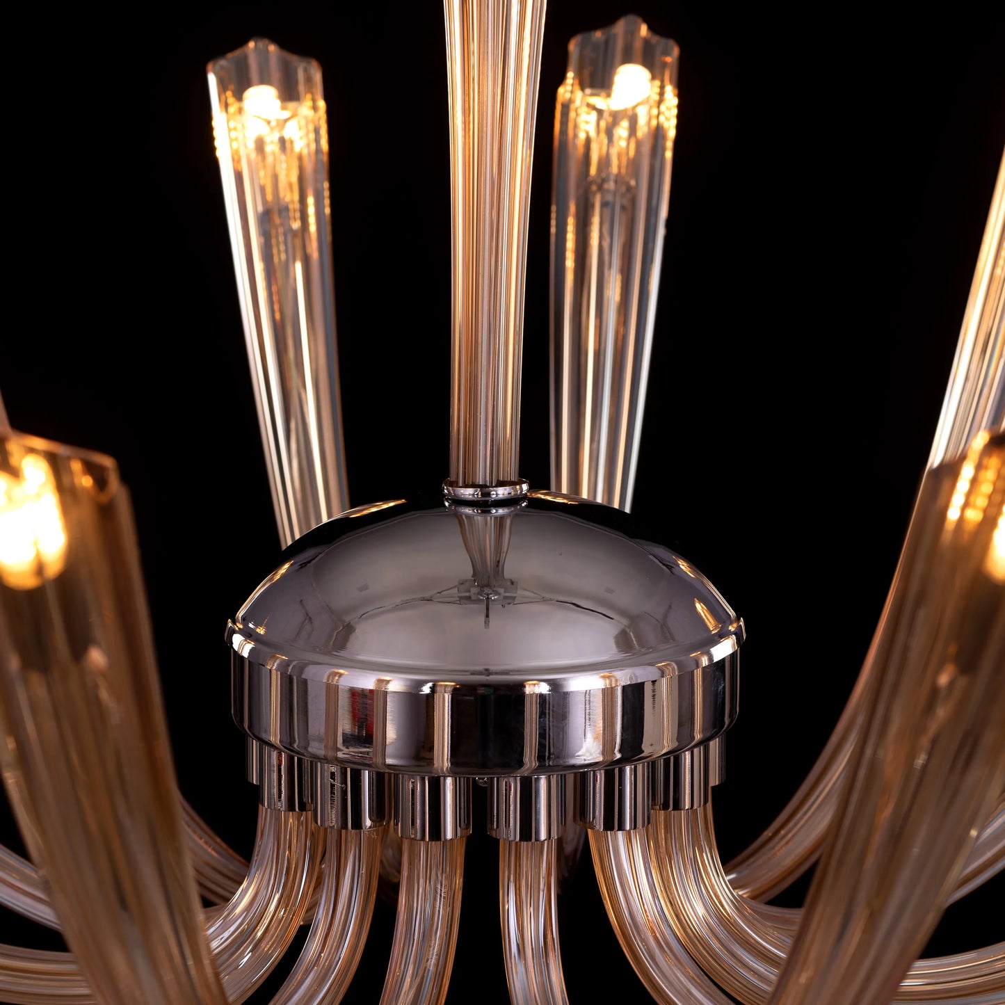 Landslide large brown glass chandelier illuminating a spacious living room with its warm, amber glow