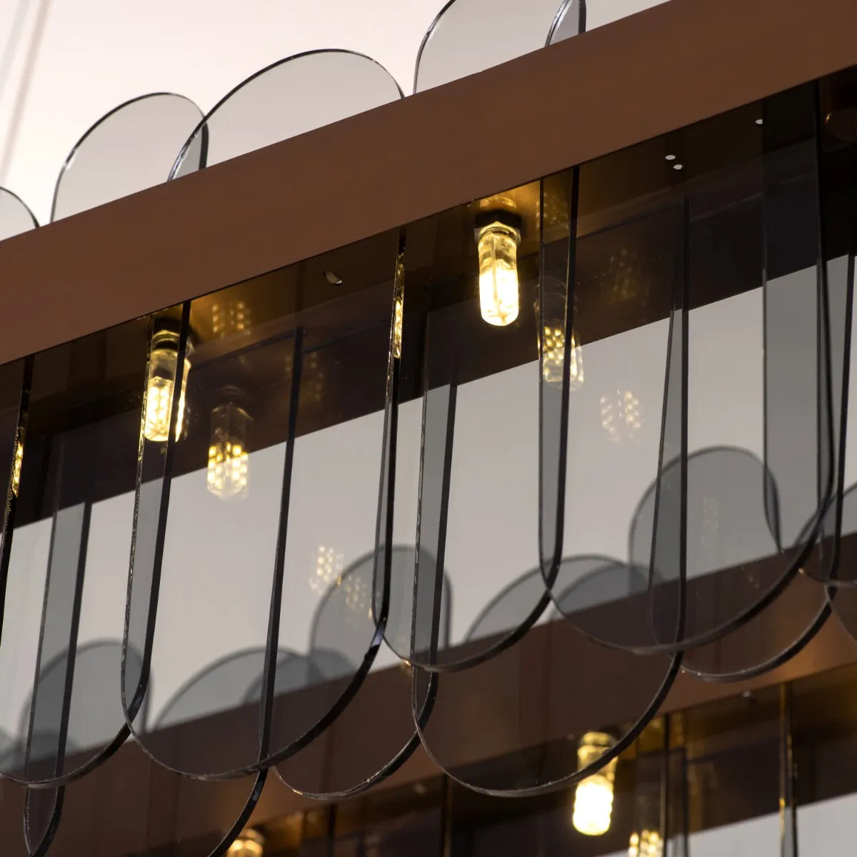 Join The Party Oval Chandelier with crystal accents and sleek metallic finish.