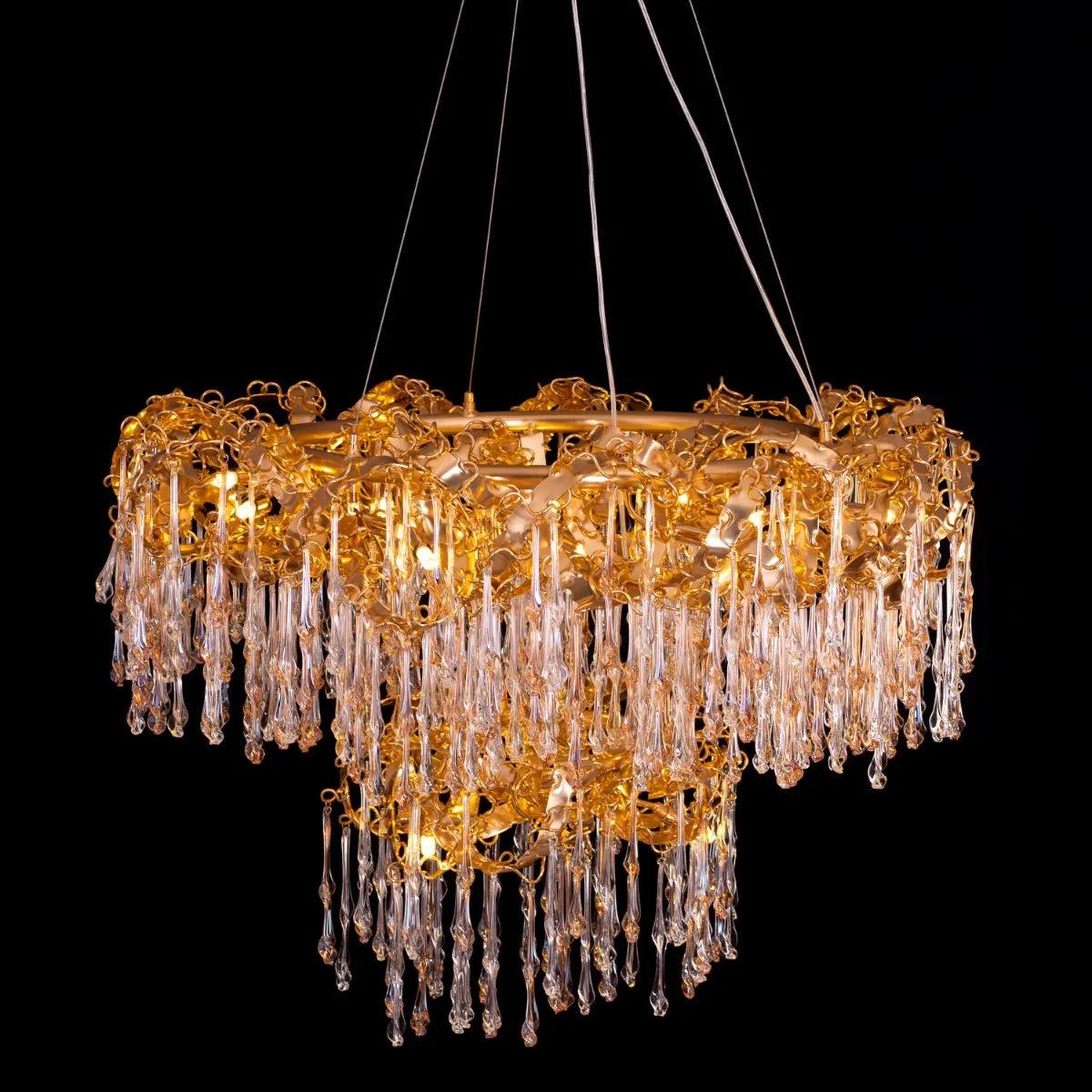 Medium-sized amber crystal chandelier with two layers resembling a golden galaxy