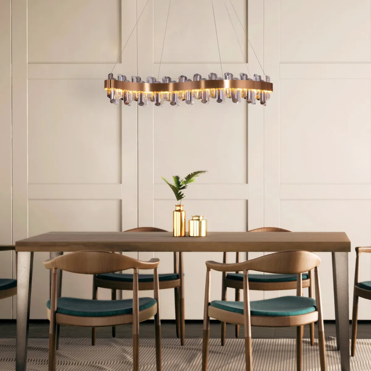Start From Scratch long crystal chandelier illuminating a grand, open-concept living space