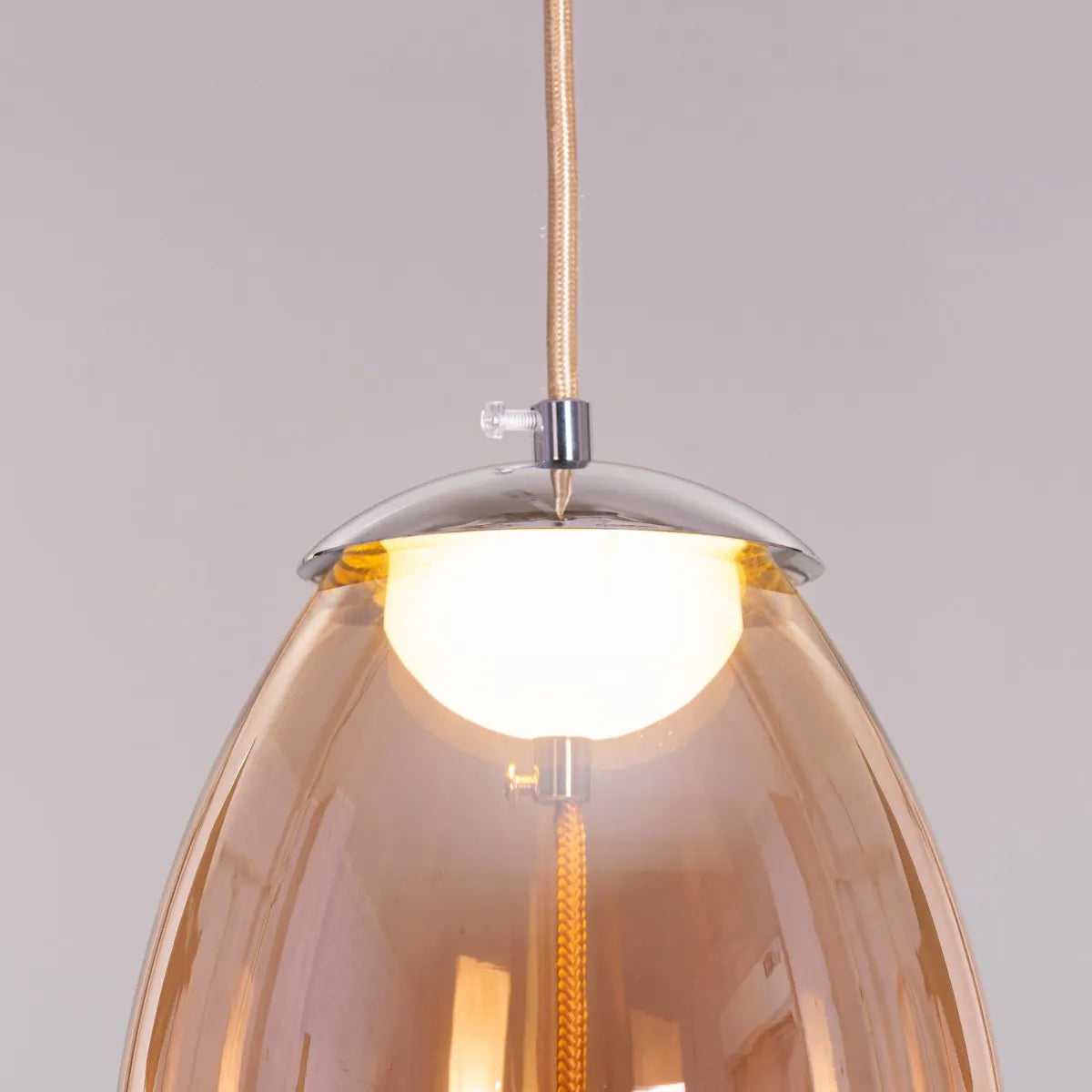 Stylish Amber Glass Pendant Light with Energy-Efficient Built-In LED