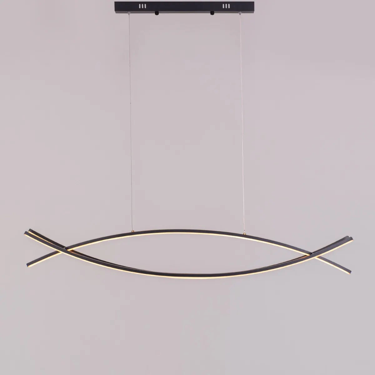 Believe In Me Chandelier suspended in a home office, its striking black elements contrasting with warm white light, creating an inspiring workspace.