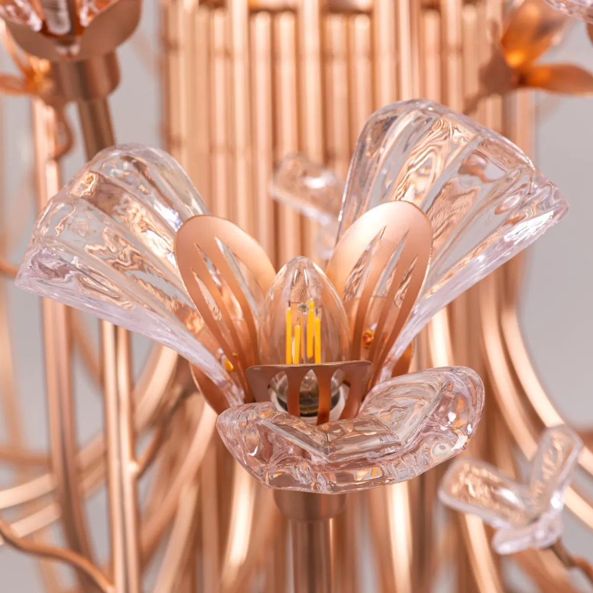 Large gold crystal chandelier with multiple tiers of luxurious sparkle