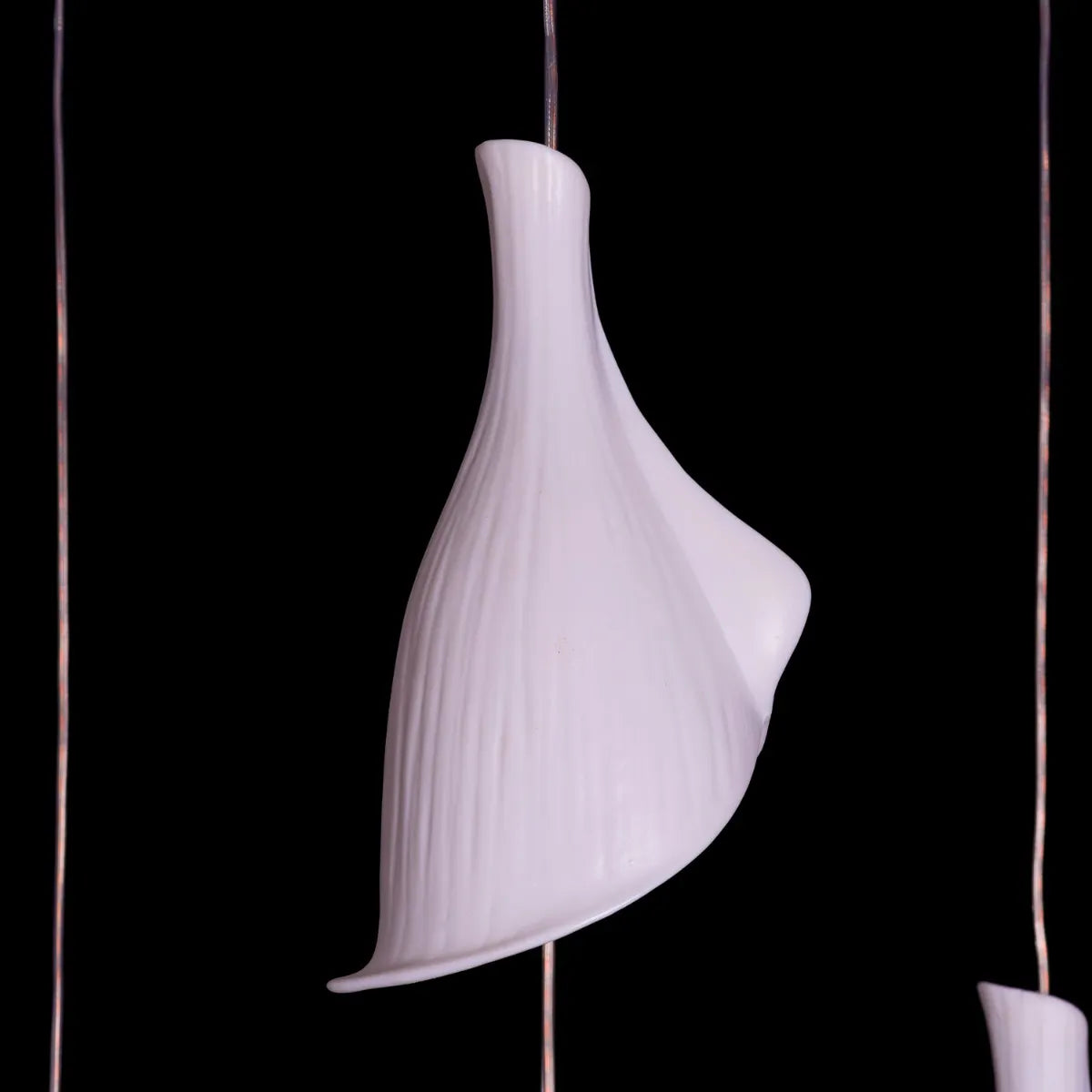 Flying In A Dream Ceramic Chandelier showcasing its intricate design.