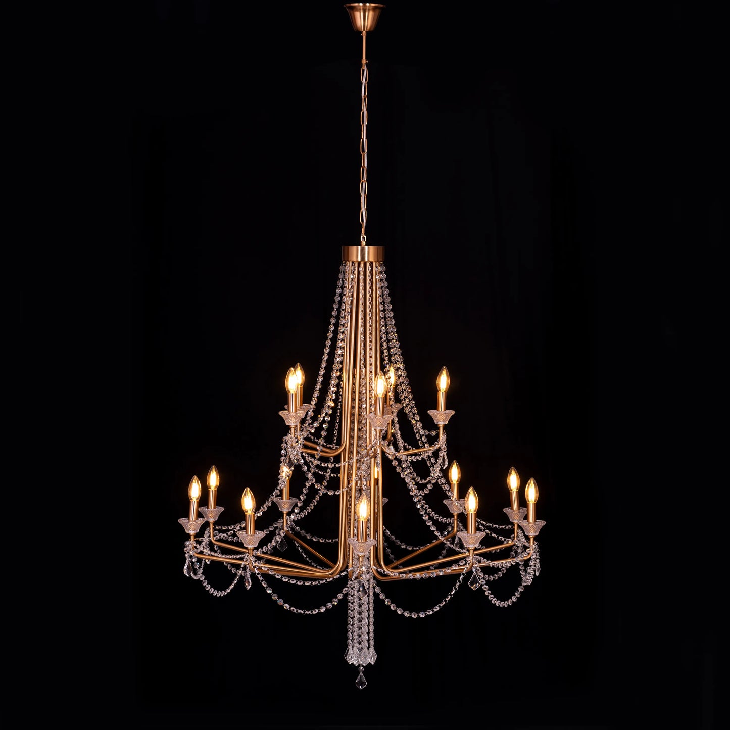 Large gold Add The Frosting crystal chandelier illuminating a grand ballroom with dazzling brilliance