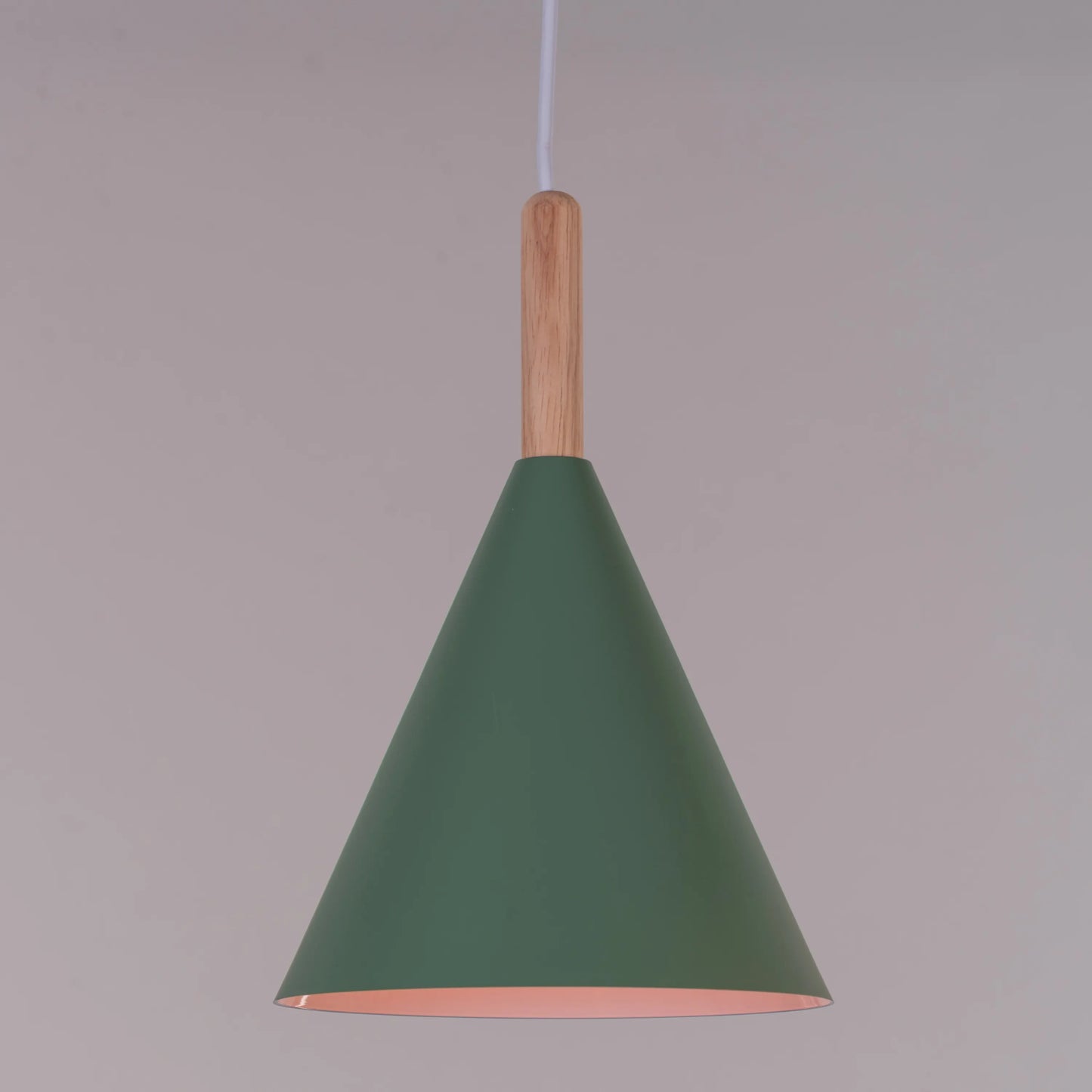 A vibrant pendant light named 'Bonus Points,' featuring three hanging heads in a playful combination of blue, green, and white. Each pendant has a smooth, minimalist design with sleek curves, creating a modern and cheerful aesthetic. The multi-colored arrangement adds a pop of color and a fun, dynamic vibe to any room.