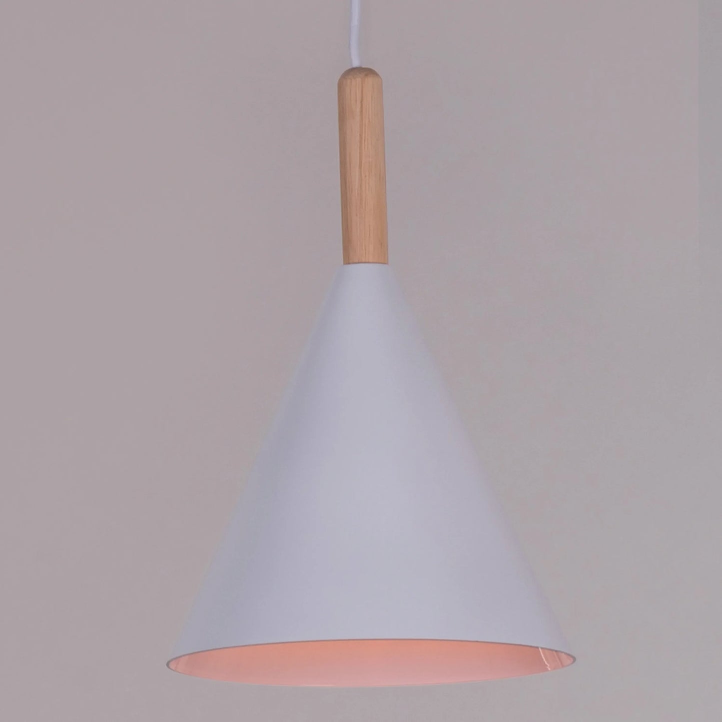 A vibrant pendant light named 'Bonus Points,' featuring three hanging heads in a playful combination of blue, green, and white. Each pendant has a smooth, minimalist design with sleek curves, creating a modern and cheerful aesthetic. The multi-colored arrangement adds a pop of color and a fun, dynamic vibe to any room.