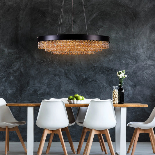 Black Tie large oval crystal chandelier illuminating an elegant dining room