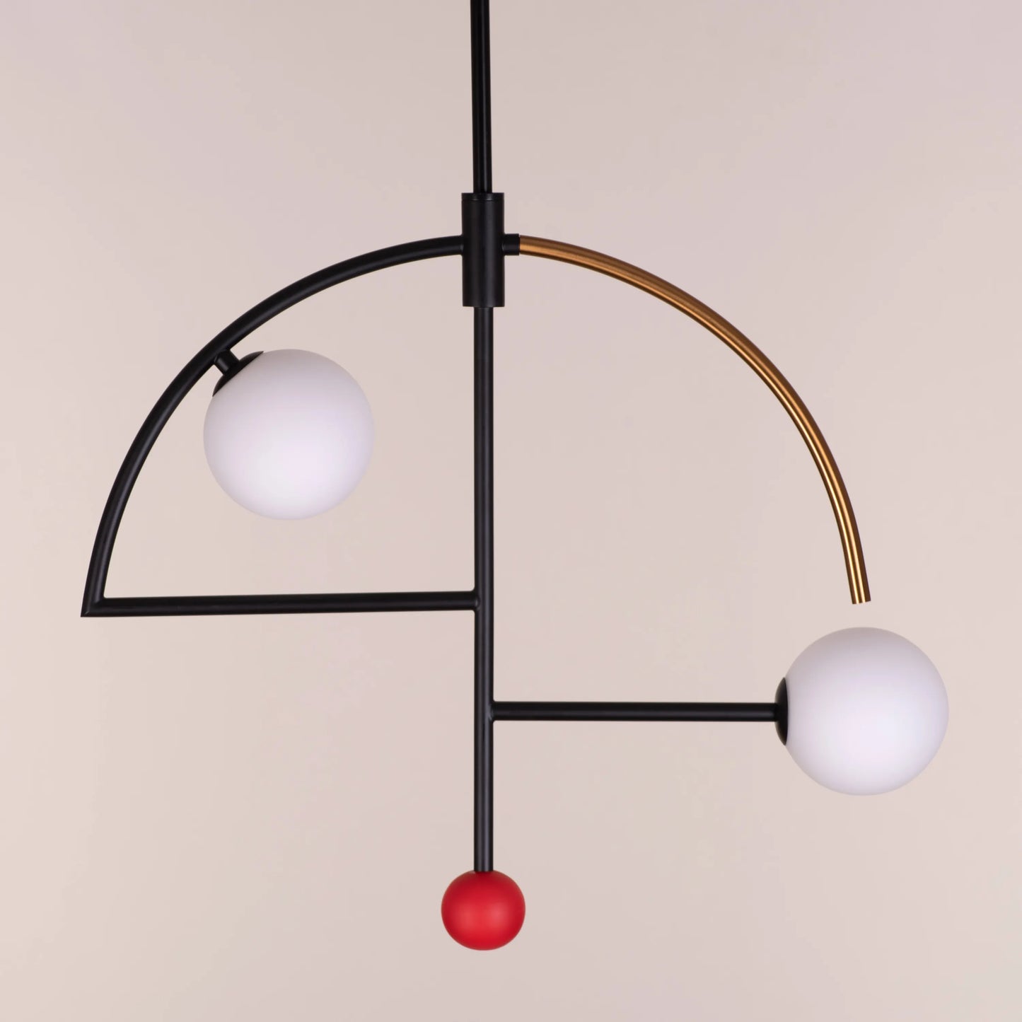 A stylish pendant light named 'Keep On Dancing' featuring a sleek black and gold design. The fixture showcases a dynamic, flowing shape, with a matte black exterior contrasted by a radiant gold interior that reflects warm light. Its modern and elegant look adds a sense of movement and sophistication to any room.