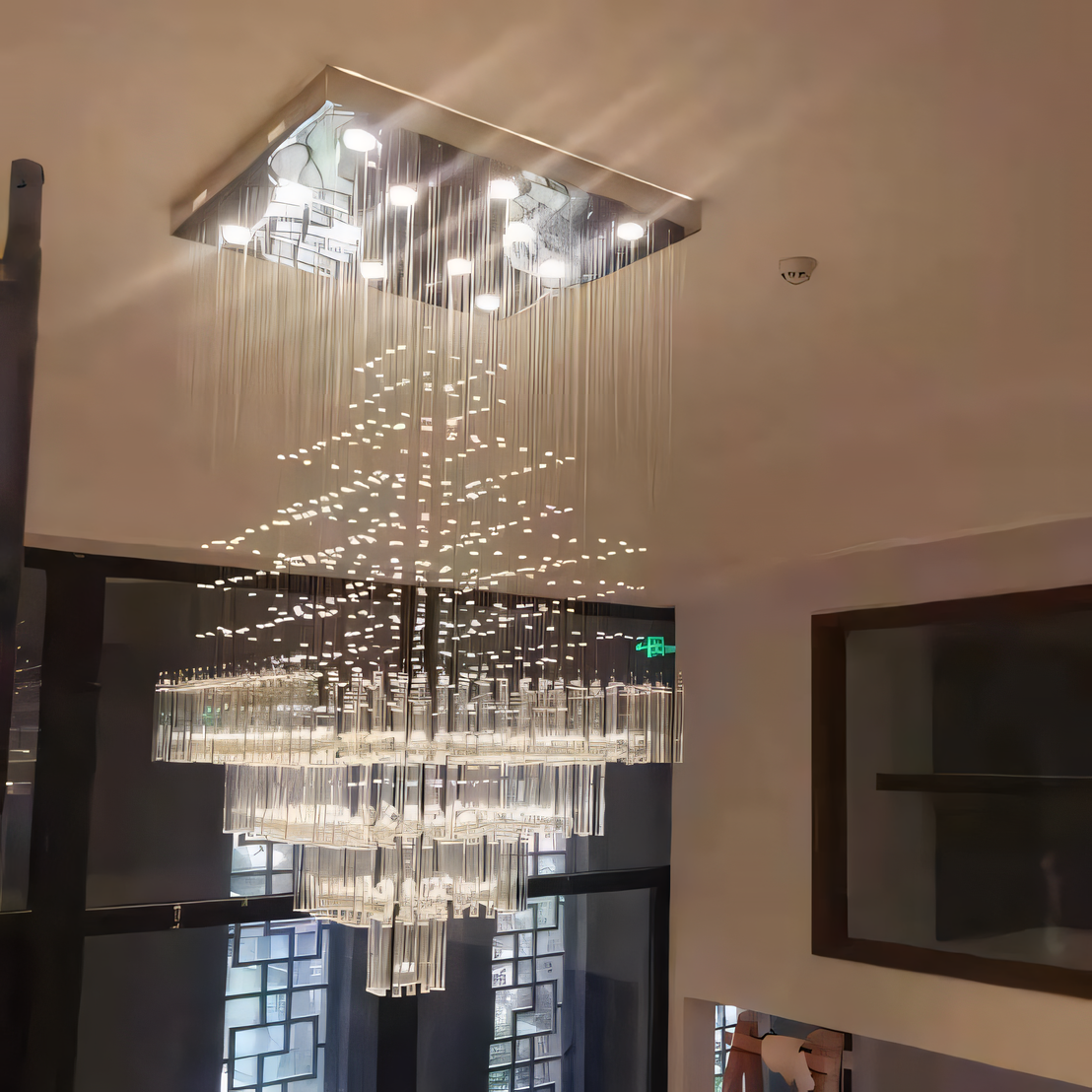 Adjustable hanging chandelier with sleek metal frame