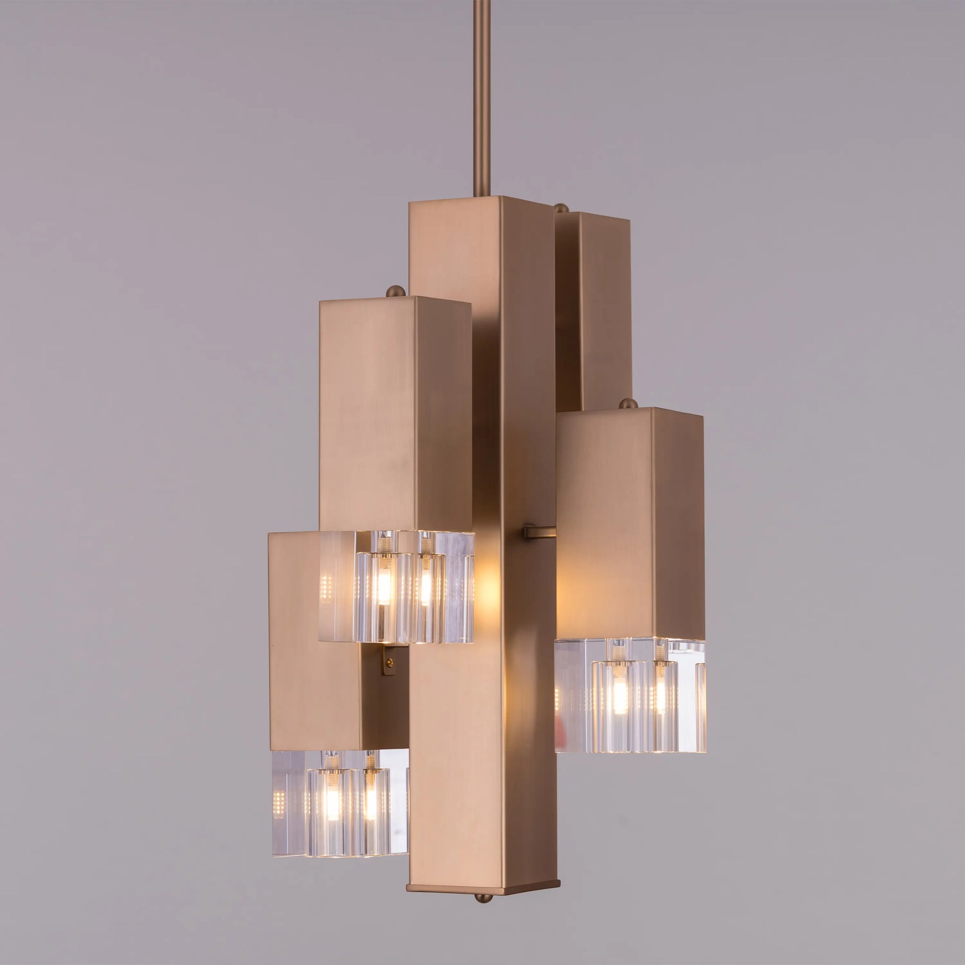 Alter Ego Crystal Chandelier: A small, gold-finished chandelier adorned with sparkling crystals.