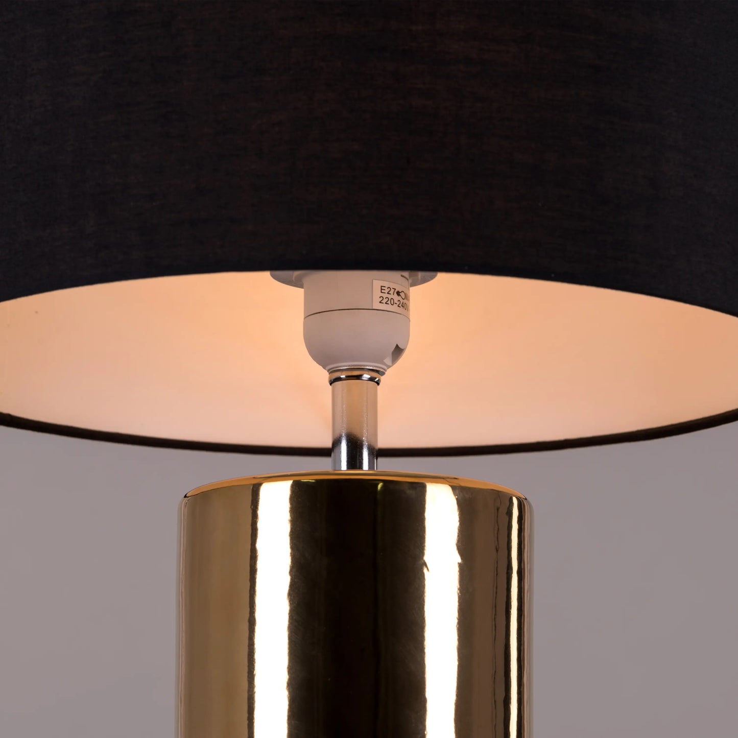 Exquisite ceramic craftsmanship in a gold table lamp