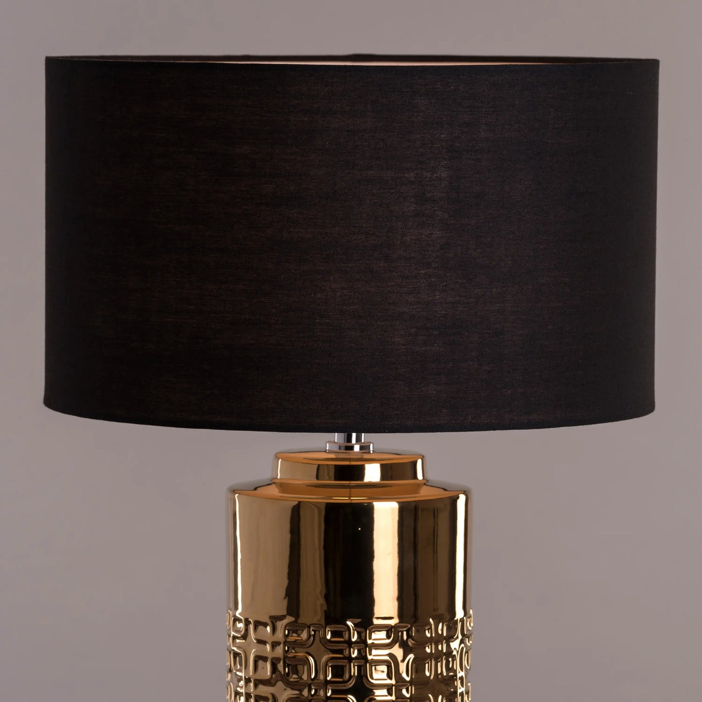 Warm, inviting glow from a smokey table lamp