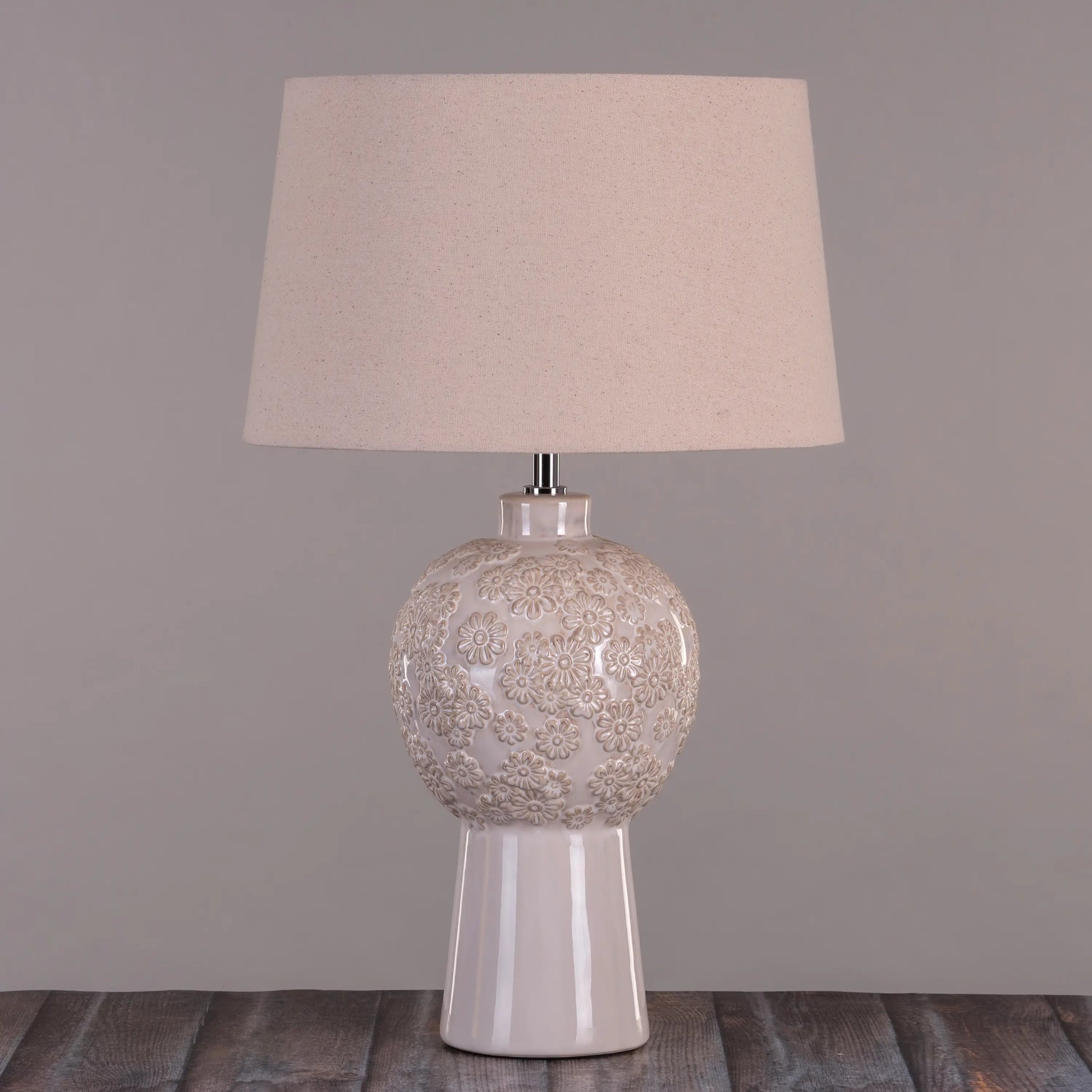 Timeless elegance in a cream ceramic table lamp