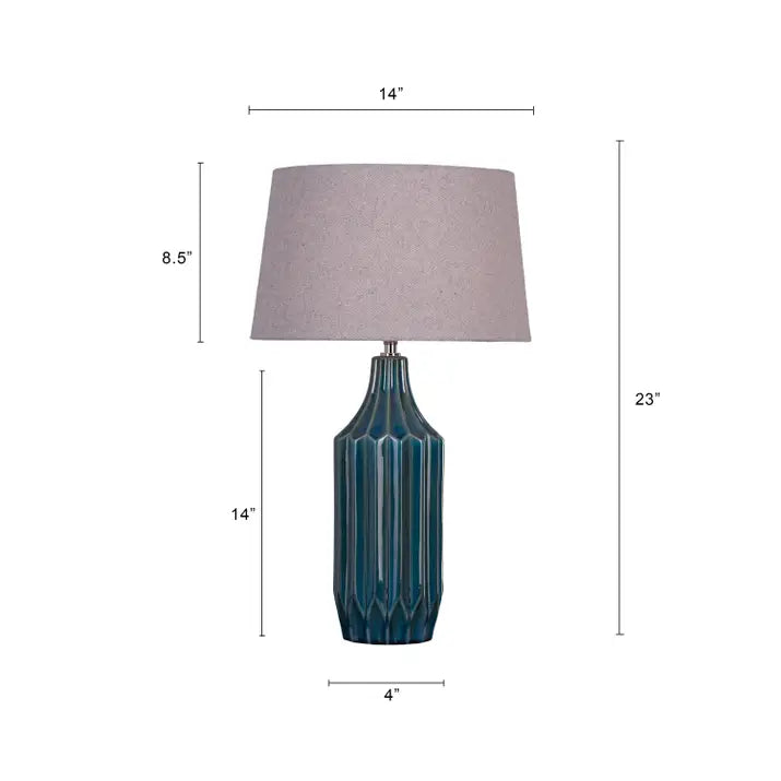 Soothing glow from blue ceramic lamp