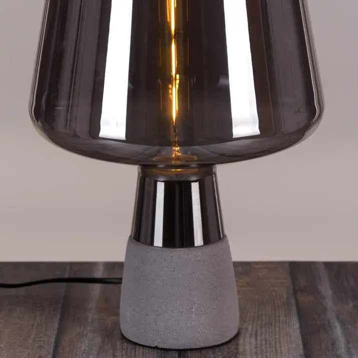 Understated luxury table lamp in smokey grey tones