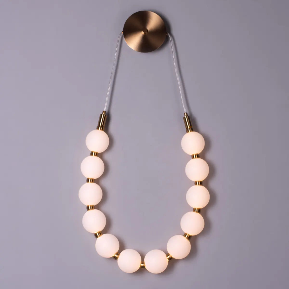 Be The Story Wall Light – statement wall light with artistic design and soft ambient glow, ideal for modern luxury interiors.