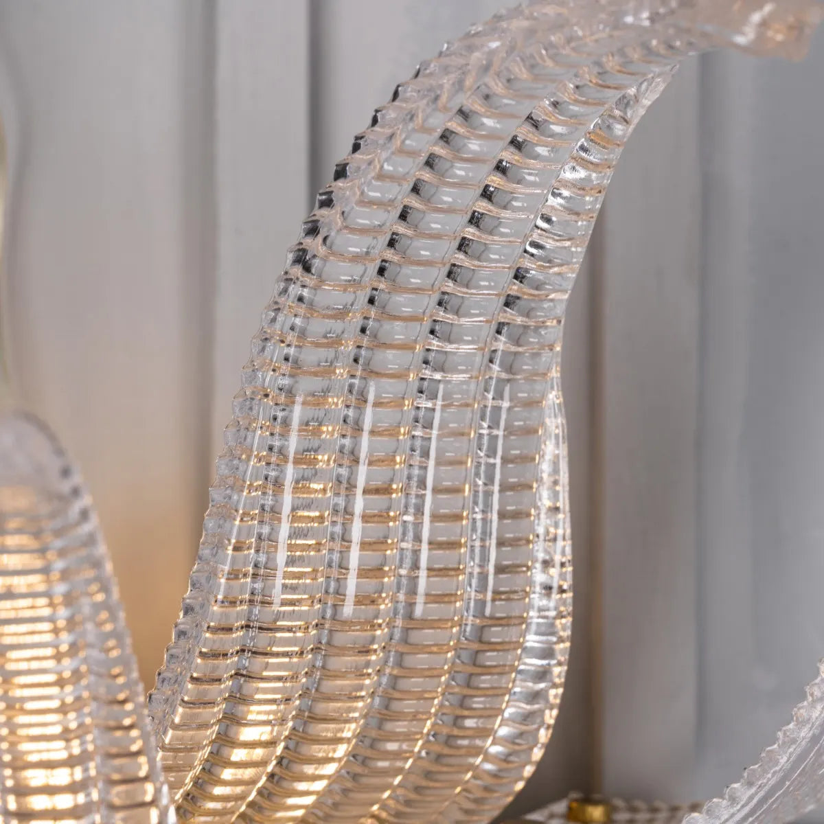 Satin Brass Wall Light Fixture - A high-quality, energy-efficient wall light with a minimalist metal frame and a captivating interplay of light and shadow.