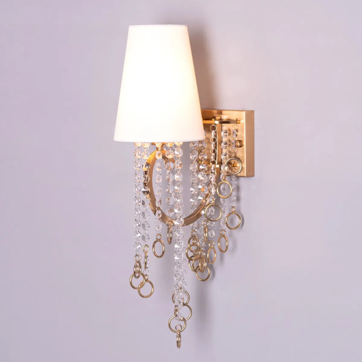 Myth & Magic Crystal Wall Light – a luxurious lighting fixture with sparkling crystals and sleek metal detailing, perfect for creating an enchanting ambiance in any space.