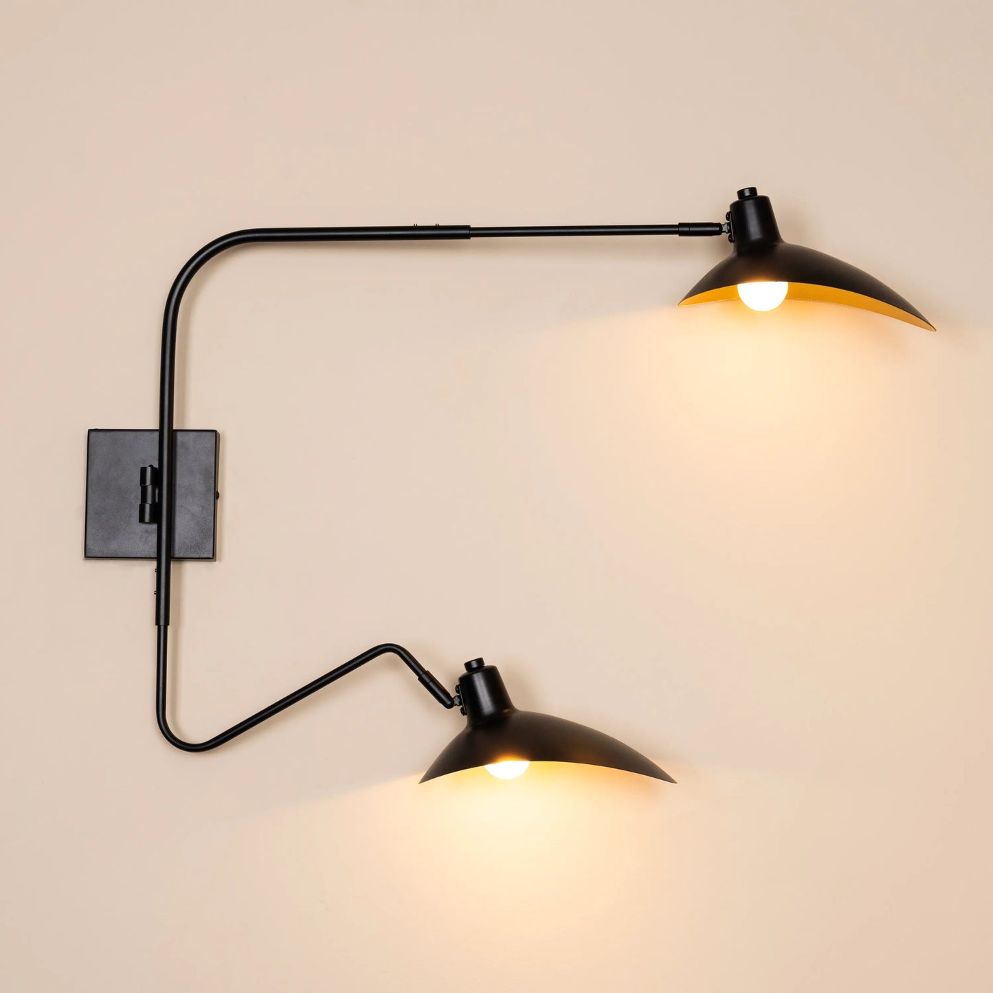 Luxurious wall light fixture with sleek metal frame