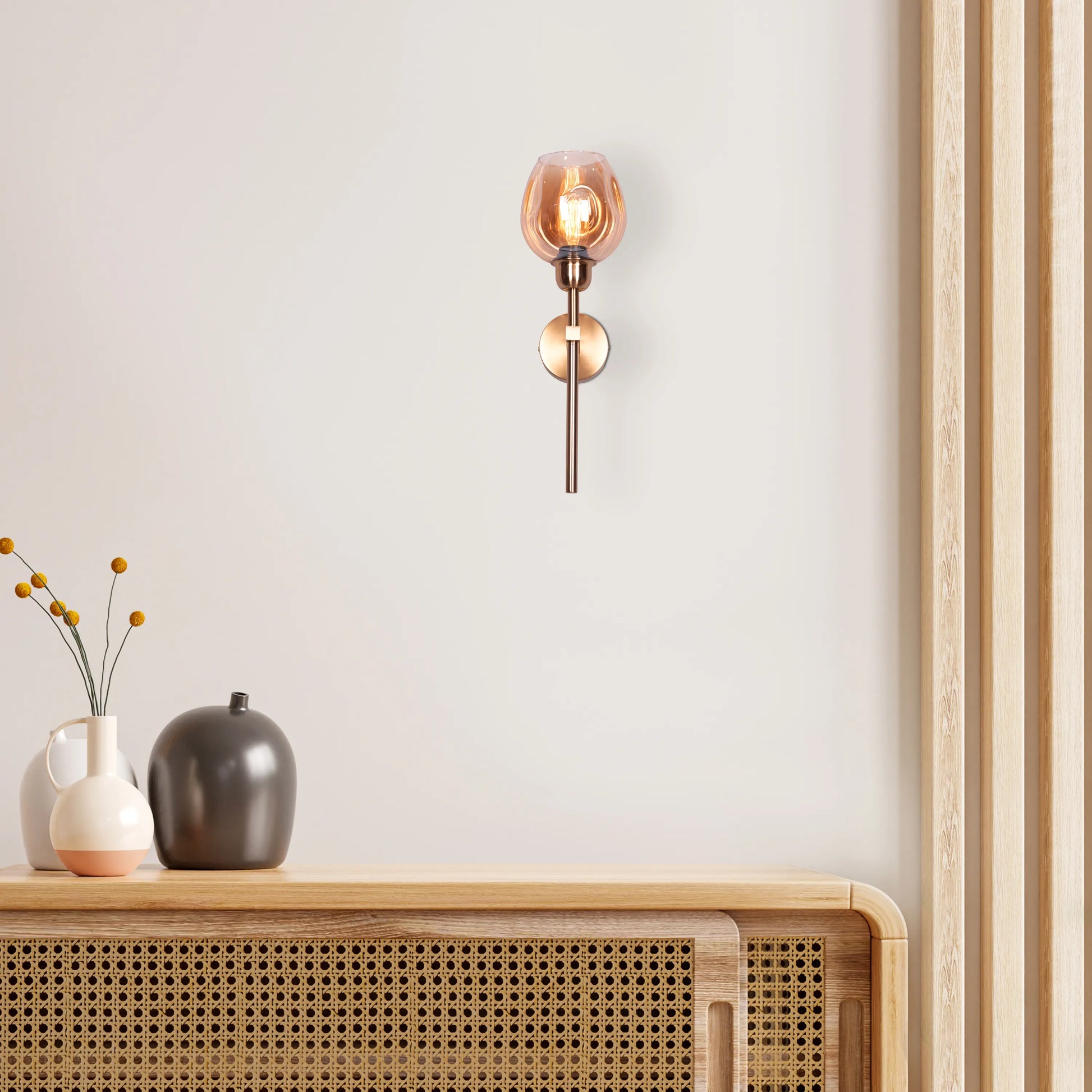 "Mykonos Memories" Clear Glass Wall Light - A sleek, modern wall sconce with a clear glass shade that diffuses warm, glowing light.