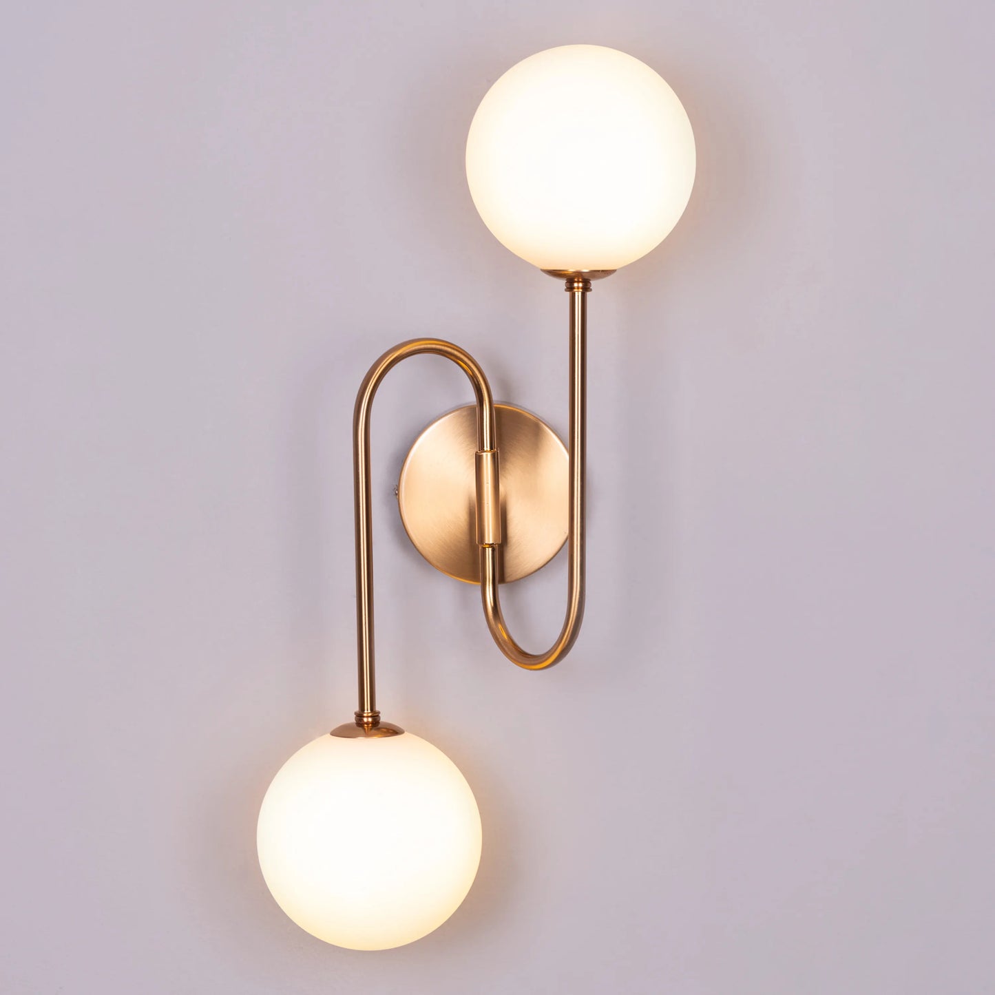 "Many Moons Away" Frosted Glass Wall Light - A sleek, modern wall sconce with a frosted glass shade that diffuses warm, glowing light.