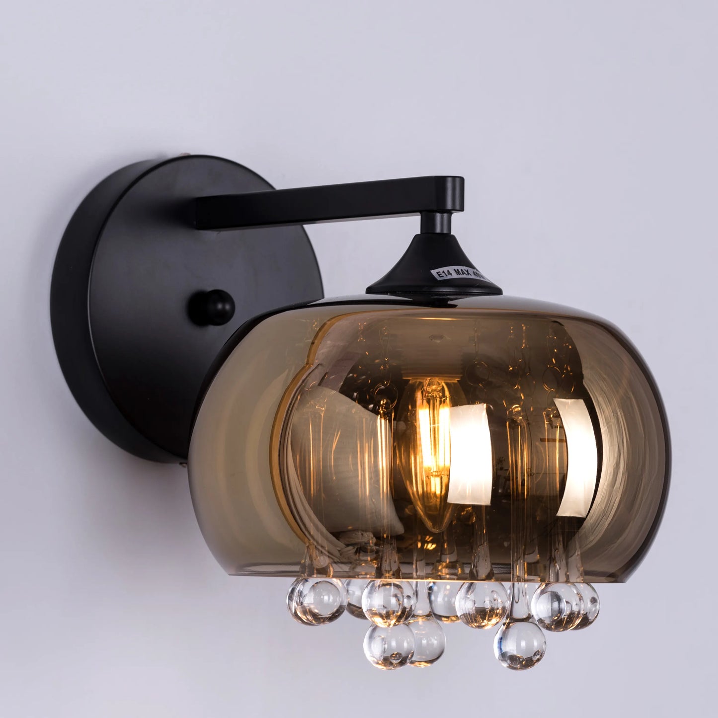 Luxurious Enchanted Crystal Wall Light featuring premium cut crystals arranged against a sophisticated black and gold framework, creating dramatic light refractions and elegant illumination patterns