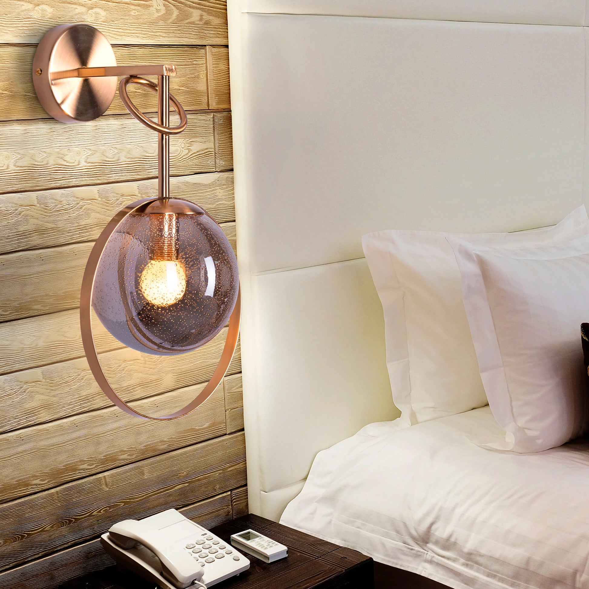 Style Icon Glass Wall Light - Elegant and timeless wall lighting fixture featuring a sleek, cylindrical glass diffuser that houses the integrated LED light source, accentuated by a metal housing in a range of sophisticated finishes.