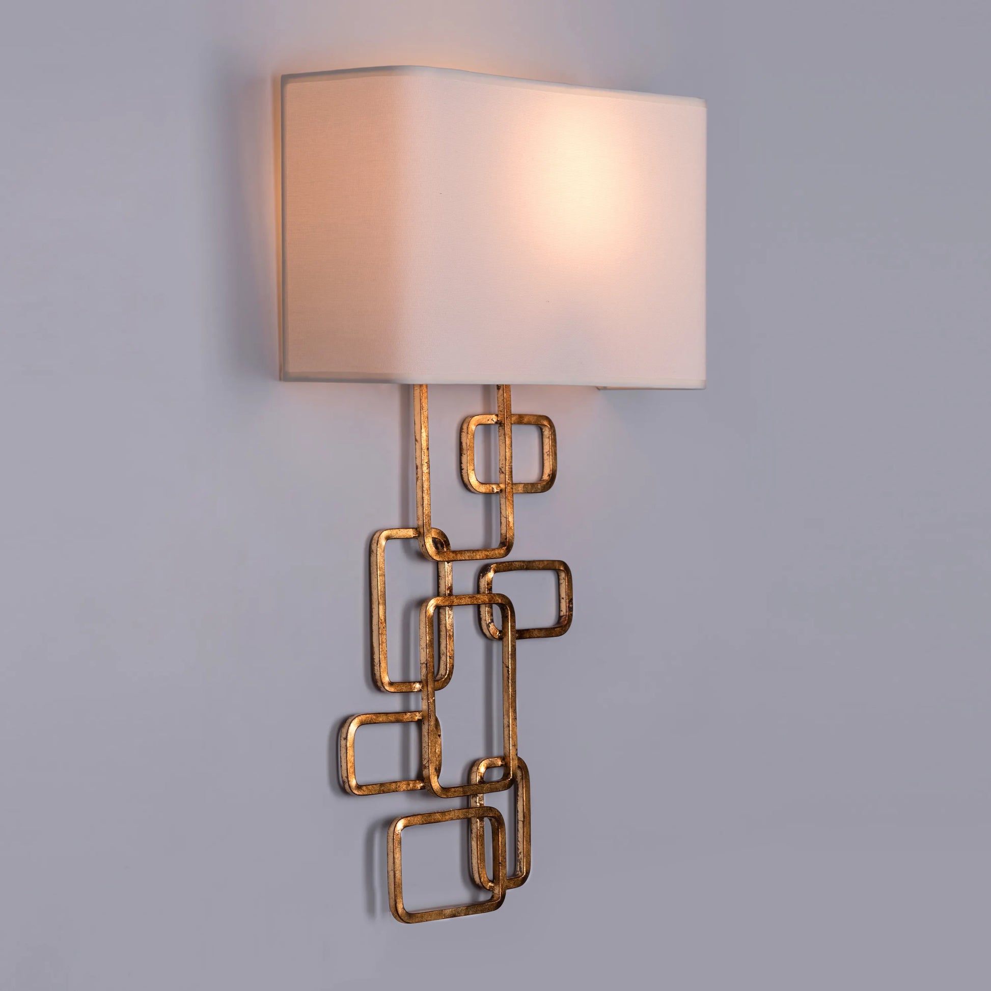 Elegant Sundowner Wall Light featuring circular sunset-inspired design with gradient illumination effect, mounted in premium metallic finish creating a floating halo of warm ambient light